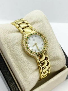 Ebel Ladies Beluga 866940 Diamond Emerald Bezel MOP Dial 18 Karat Yellow Gold