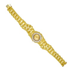 Ebel Lady's Gold and Diamond Cocktail Wristwatch In 18k