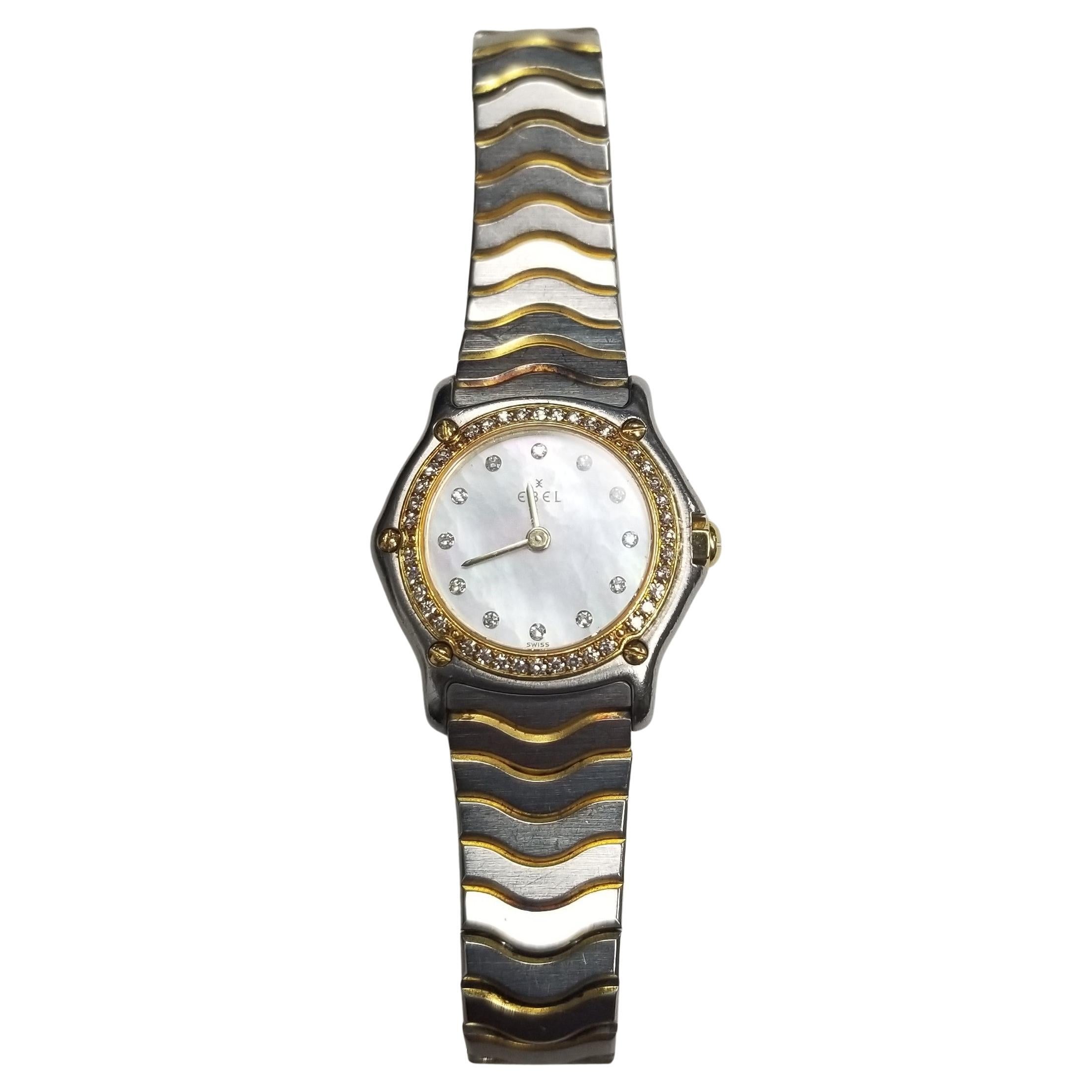 Ebel Sport 18k Yellow Gold 
Stainless with Diamond Bezel and Numbers