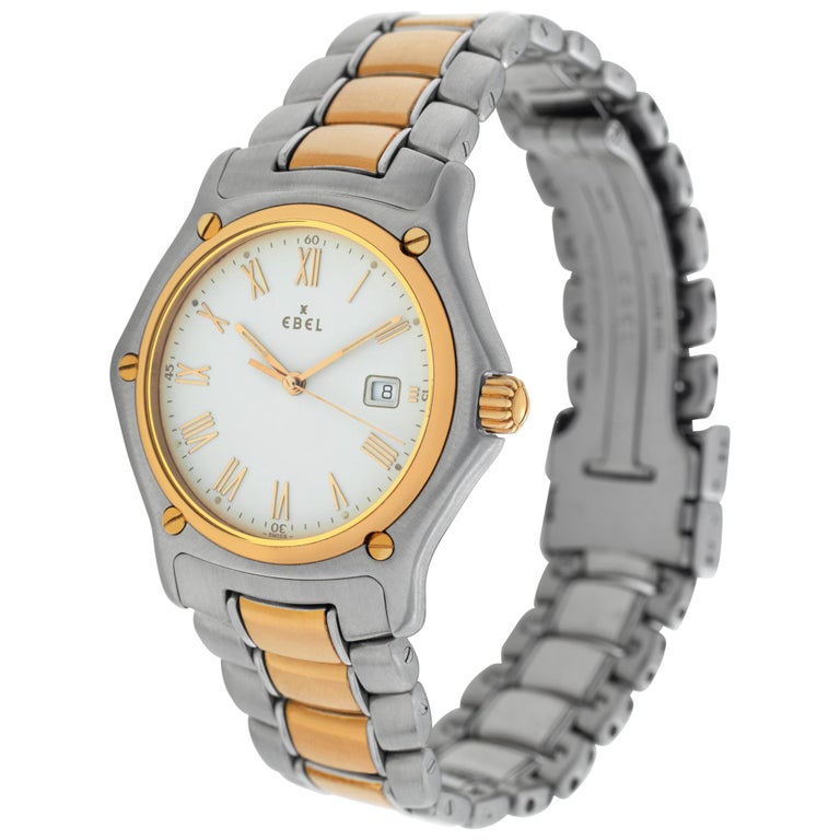Ebel Sportwave in 18k & stainless steel with 18k goldfill bracelet. Quartz w/ sweep seconds and date. 34 mm case size. Ref 187902. Circa 1990s. Fine Pre-owned Ebel Watch. Certified preowned Sport Ebel Sportwave 187902 watch is made out of Stainless