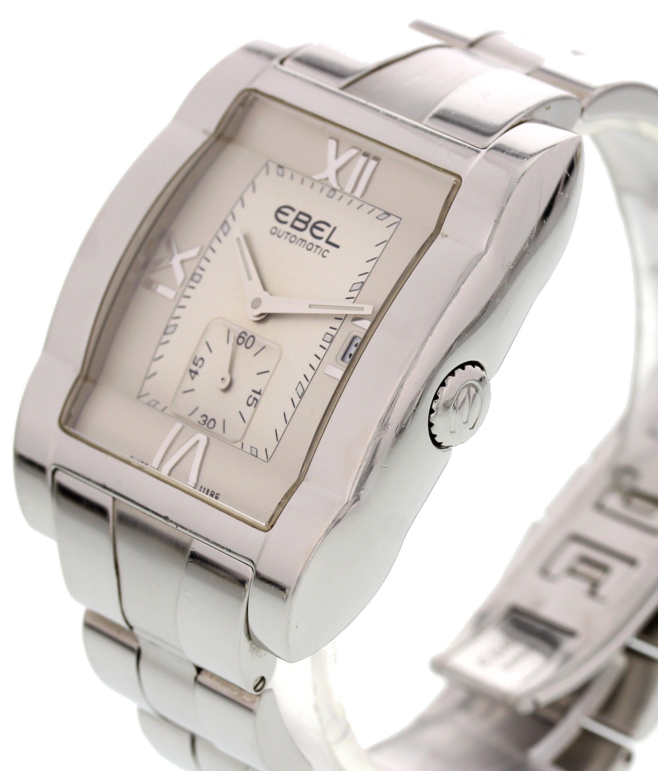 Unisex Ebel Tawara. 36mm stainless steel case. Stainless steel bezel. Silver dial with steel roman numeral 12, 9, and 6, luminous hands and markers. Seconds sub dial. Date display. Stainless steel band with hidden double folding clasp. Will fit a