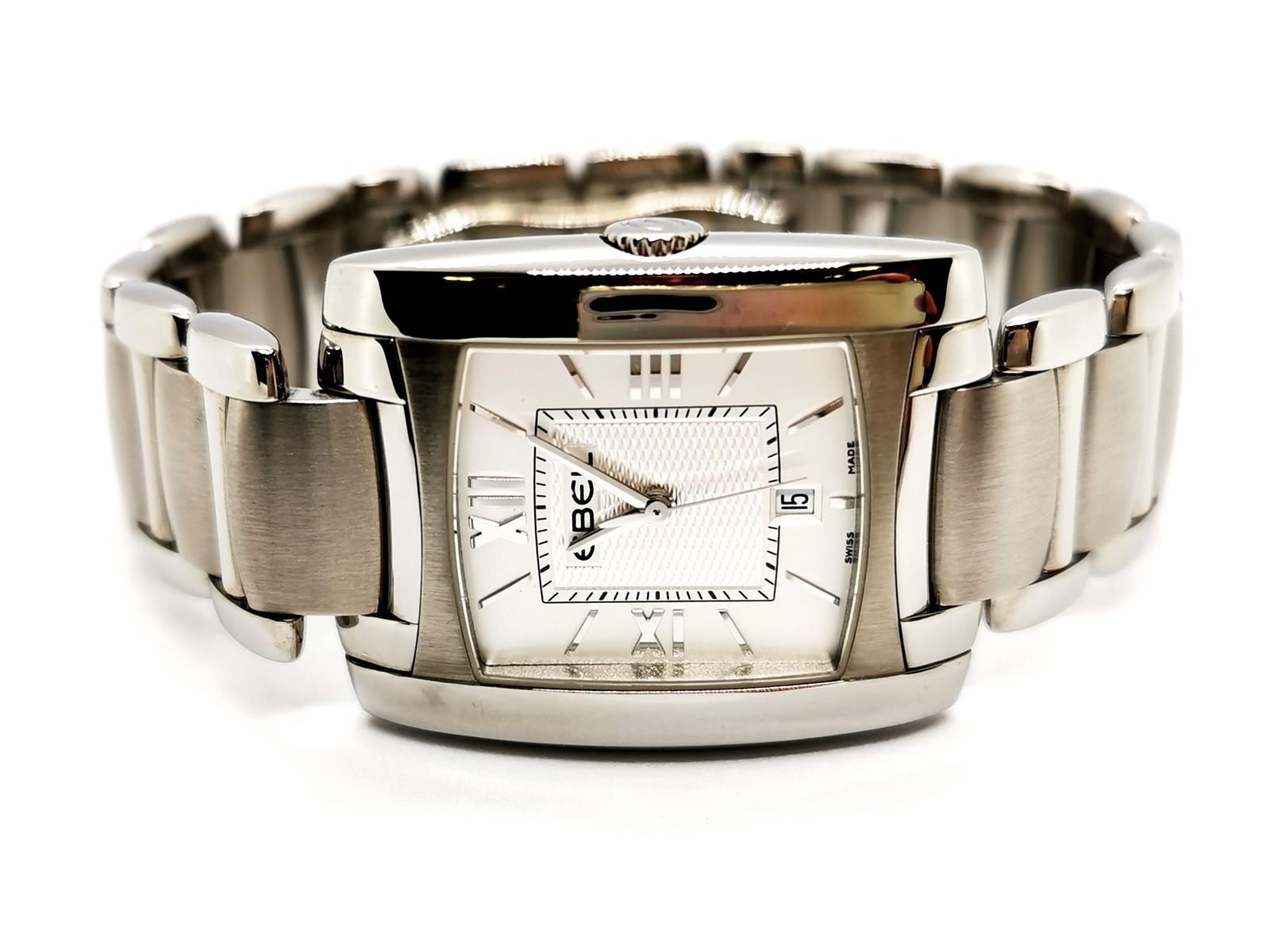 Women's watch. signed from home Ebel Brasilia model. stainless steel. quartz movement. white dial. Roman numerals. date. folding buckles. sapphire. rectangular housing. housing size: 2.8 cm x 3.4 cm. length 21 cm. strap width: 1.85 cm. total weight: