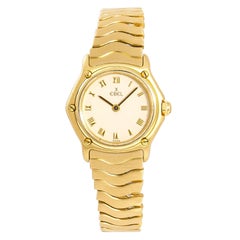 Ebel Wave 866901 Montre pour femme à quartz en or jaune 18 carats, cadran ivoire