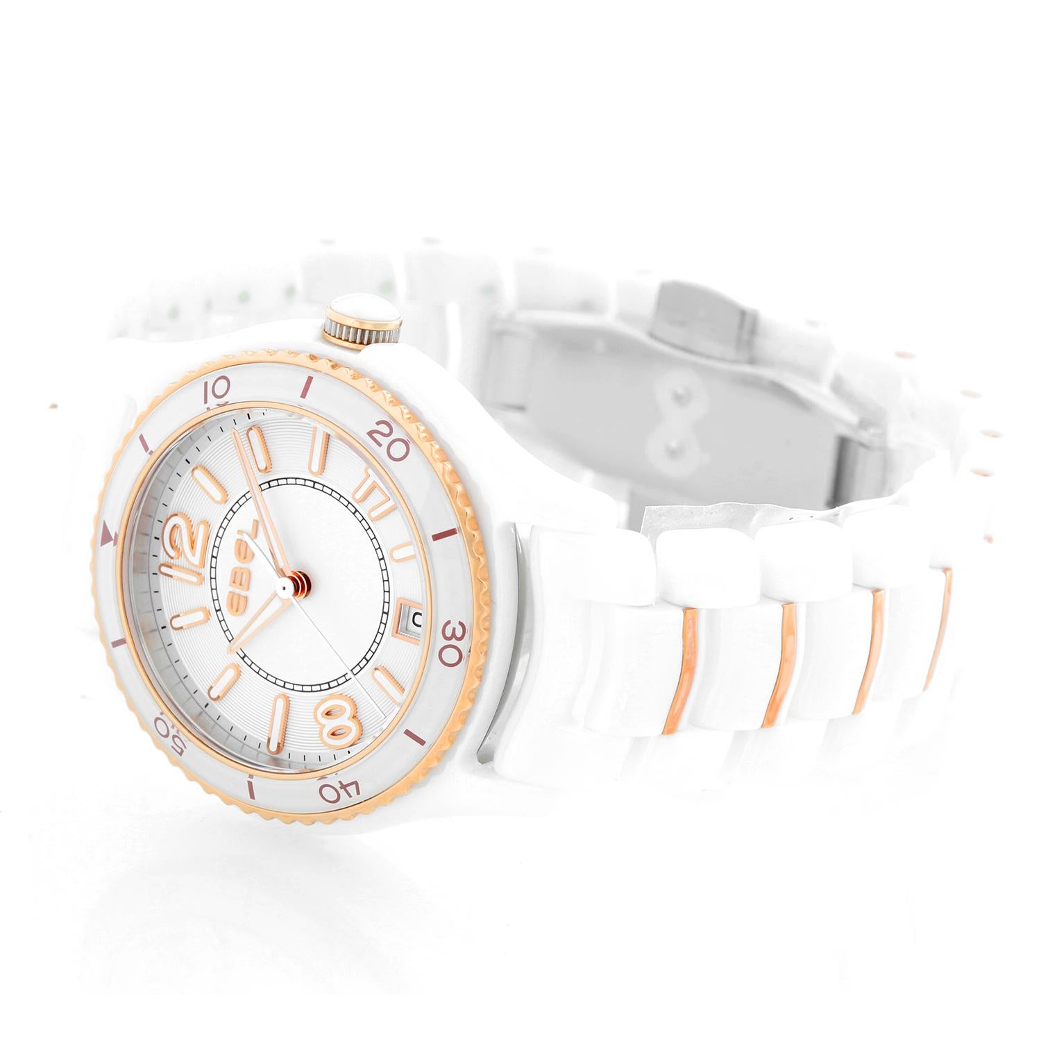 Ebel X-1 Silver Dial White Ceramic Ladies Watch 1216113 - Quartz movement. Scratch resistant sapphire crystal. White ceramic case, uni-directional rotating 18K rose gold bezel with a white ceramic top ring ( 34 mm) . Silver dial with luminous rose