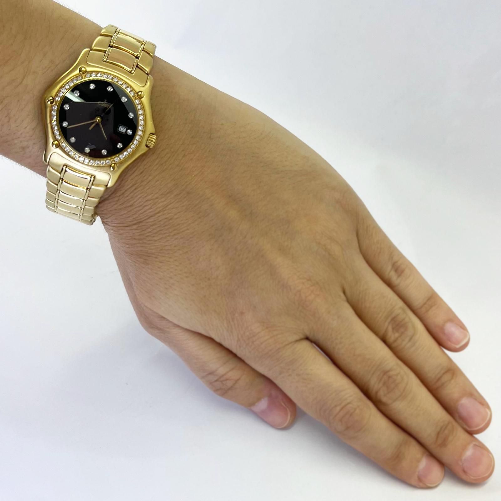 Pre-owned Ebel 1911 quartz watch crafted in 18 karat yellow gold with factory diamond bezel and dial on dual finish gold bracelet with folding clasp. Fits up to 7.25 inch wrist. Finished weight is 144 grams. Lightly polished with new battery