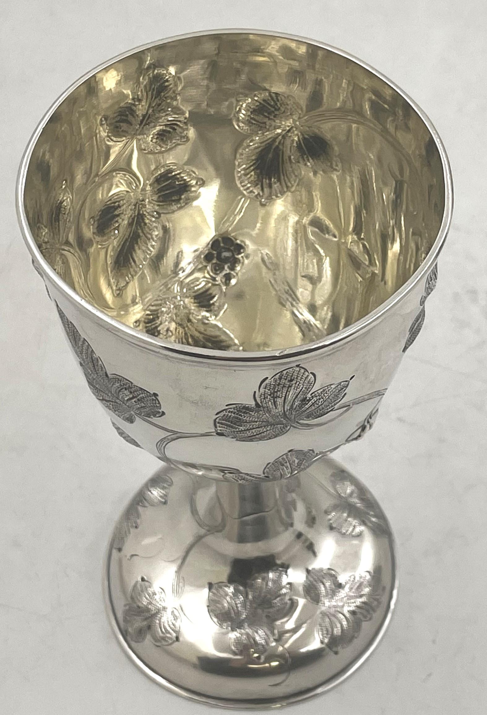 Eben Cutler, coin silver goblet from the 19th century adorned with vine-like motifs, faintly gilt inside. It measures 6 1/8'' in height by 3 1/2'' in diameter at the top, weighs 4.6 troy ounces, and bears hallmarks as shown. This goblet could serve