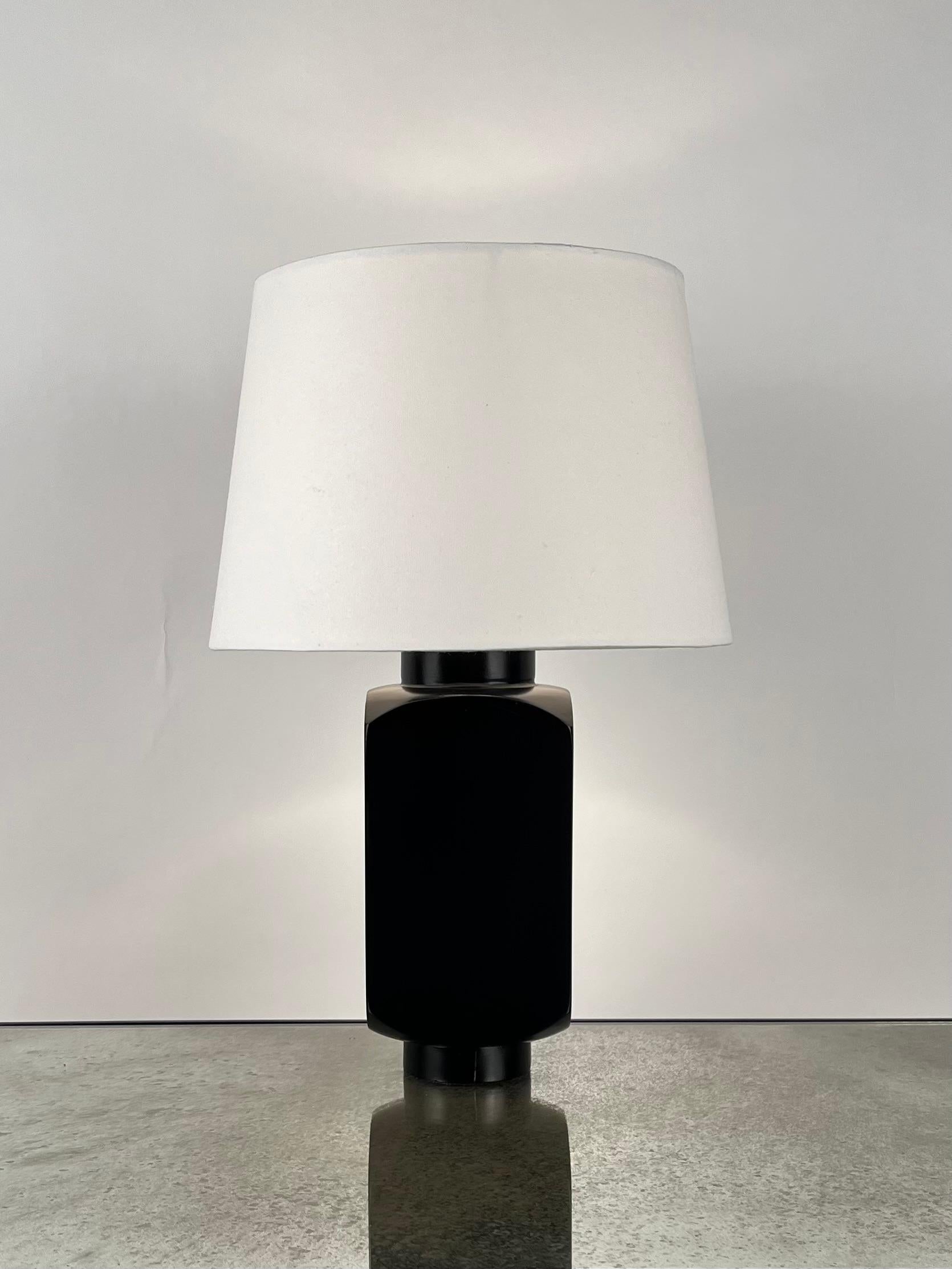 Elegant 'Ébène' table lamp with parchment shades by Design Frères.

Wired with high-end twist cord and 3-way switche (on, half intensity, off.) 40w filament bulb is included in your order. European style parchment shades (no harps or finials)