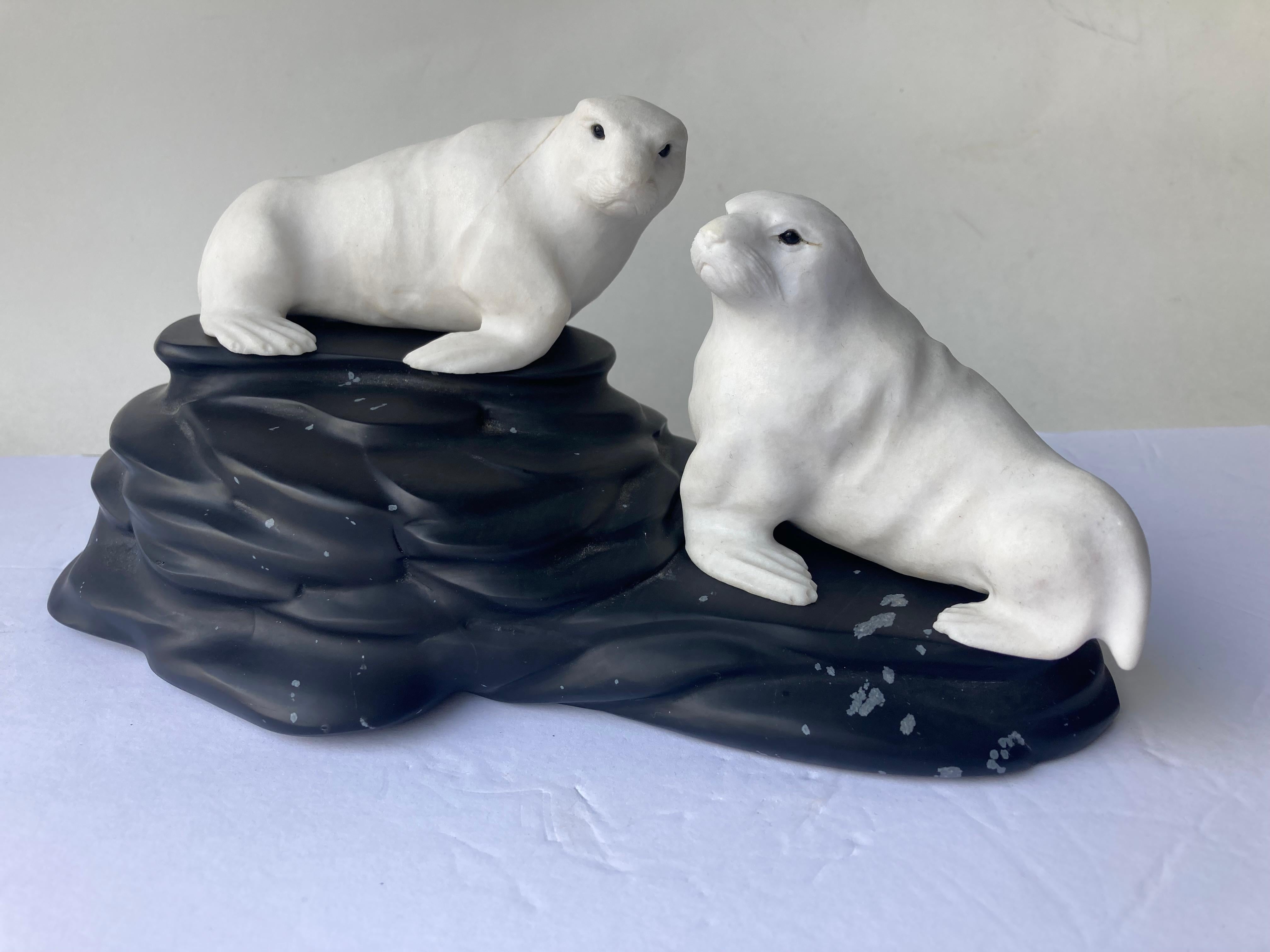 Eberhard Bank Carving, Sculpture of Two Dolomite Seals, on Black Obsidian Base In Good Condition For Sale In Los Angeles, CA