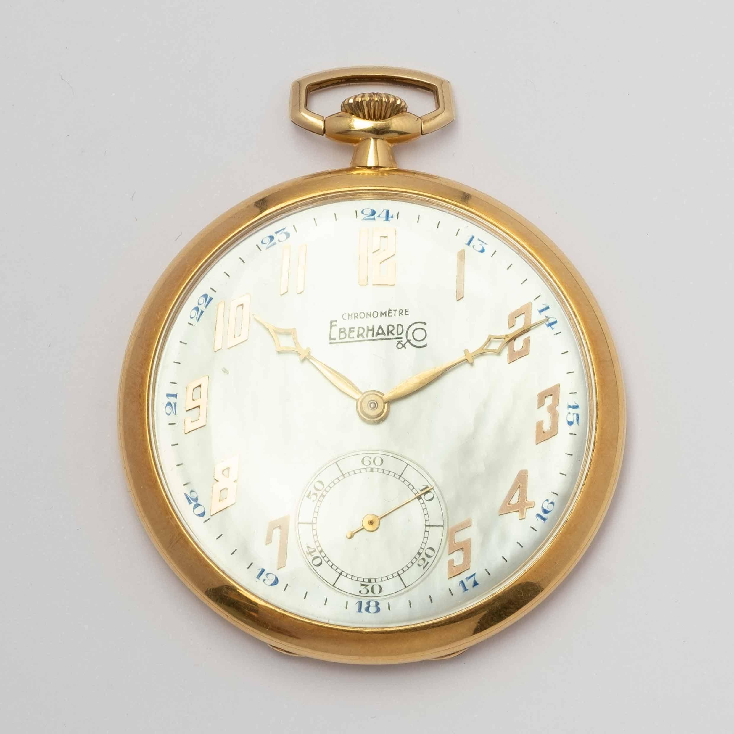 Rare and elegant pocket watch signed Eberhard & Co., crafted in 18ct gold in 1930. Its most distinctive feature is the mother-of-pearl dial, an uncommon and refined detail that enhances its charm and collectible value.

A fine example of Art Déco
