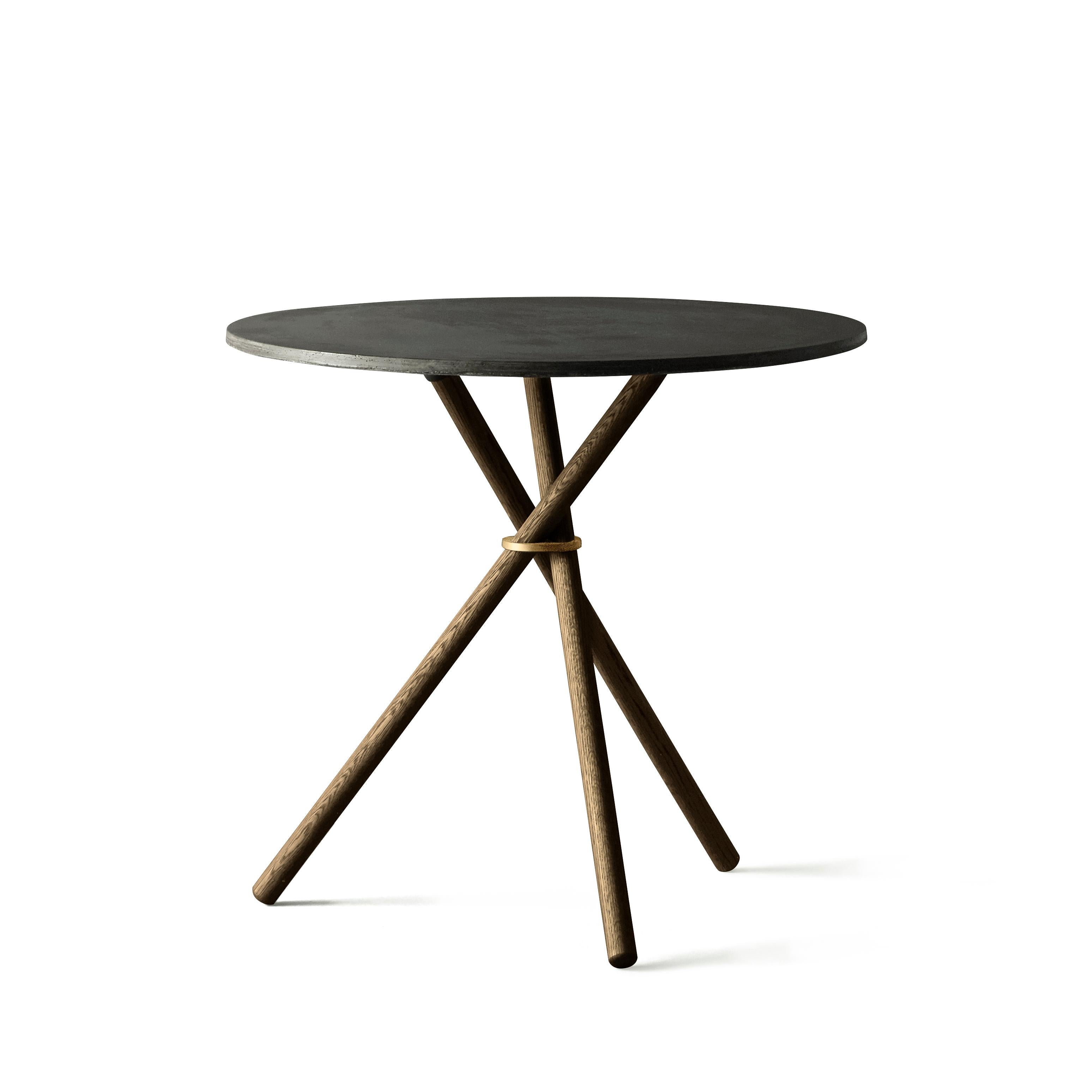 Designed to fit into most settings and works perfect as a small kitchen table. The table is constructed by three sub elements: The assembly ring, wooden legs and table top in either concrete, oak or birch, allowing it to suit a range of
