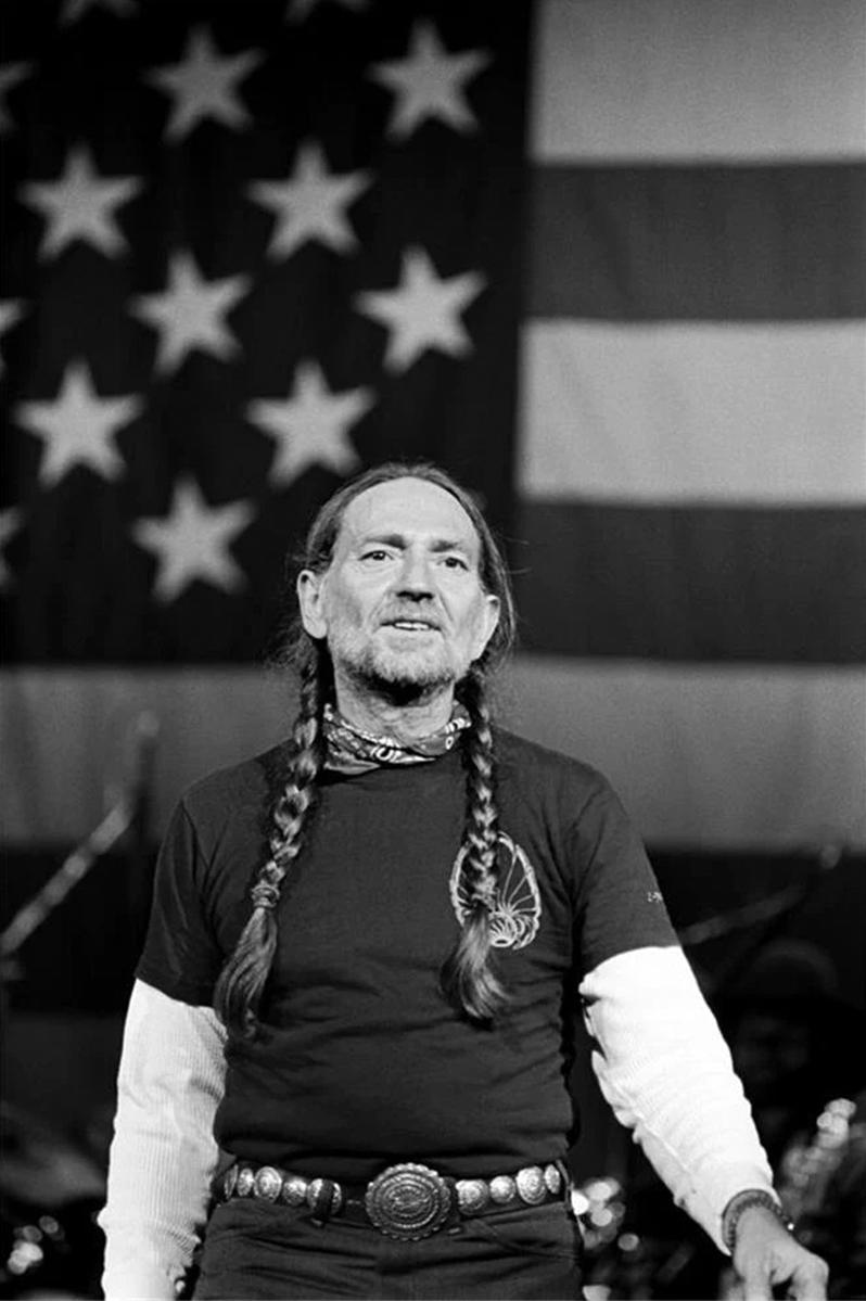 Willie Nelson at The Palladium in NYC on December 11, 1980 by Ebet Roberts.

Signed limited edition, hand printed silver gelatin print.

Ebet Roberts began her career in 1977 when she began documenting the evolving punk scene at CBGB’s in New York.