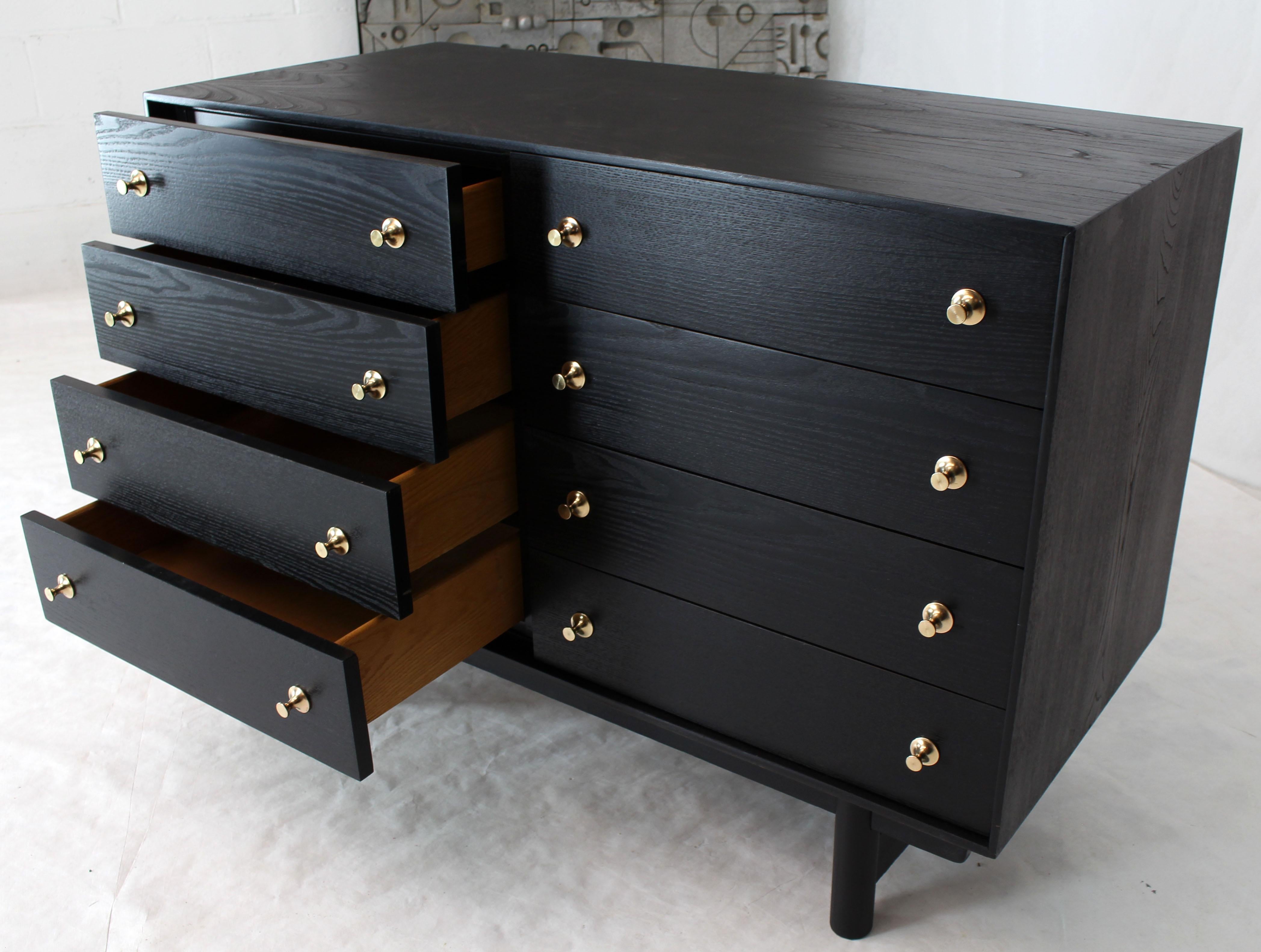 black and brass dresser