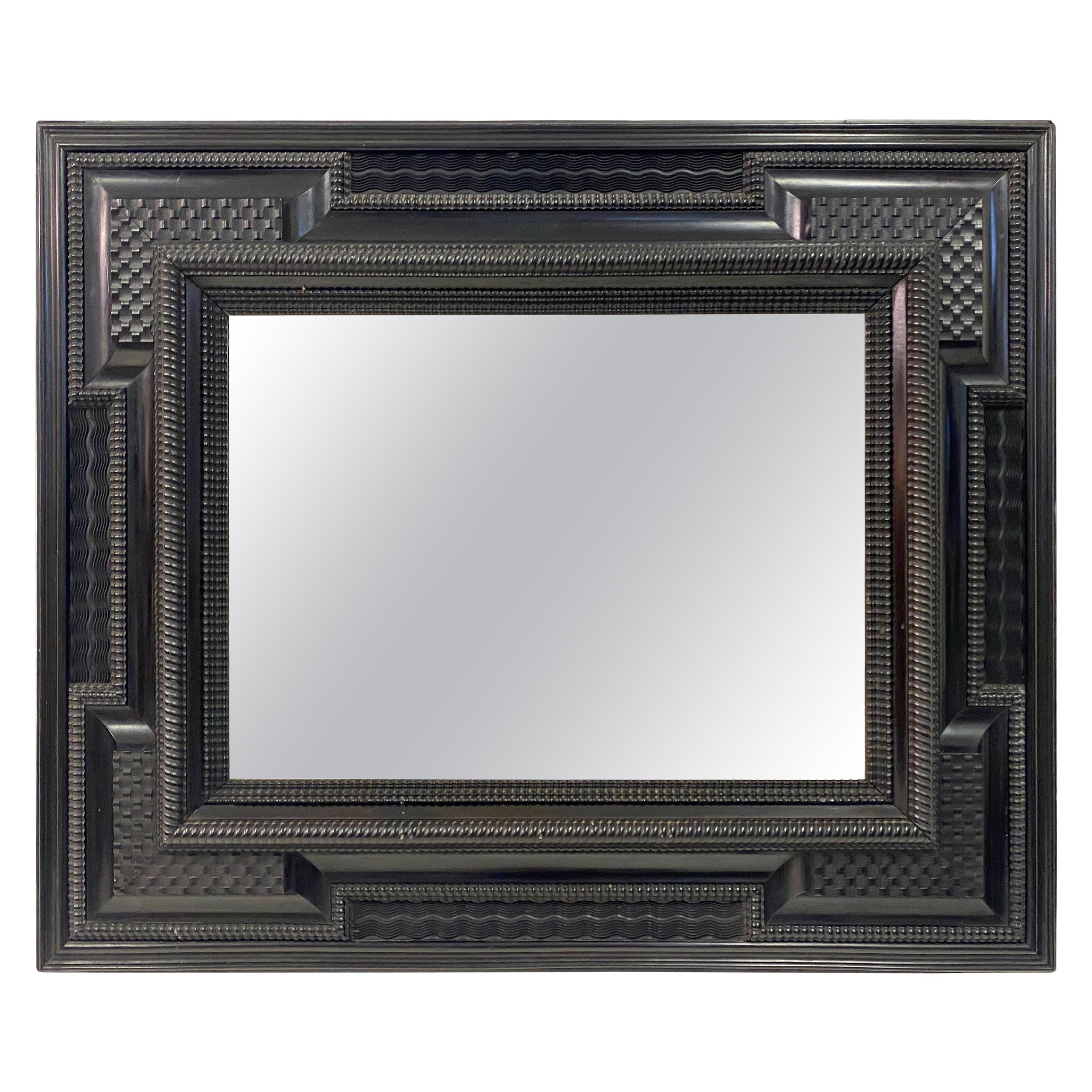 Ebonised 19th Century Flemish Ripple Moulded Mirror For Sale