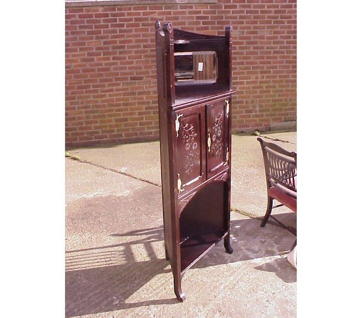 Hand-Carved An Aesthetic Movement Mahogany Corner Cabinet with Incised Floral Decoration For Sale