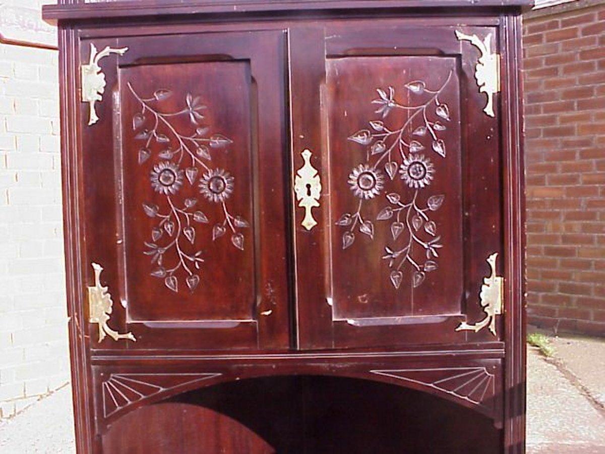 Beech An Aesthetic Movement Mahogany Corner Cabinet with Incised Floral Decoration For Sale