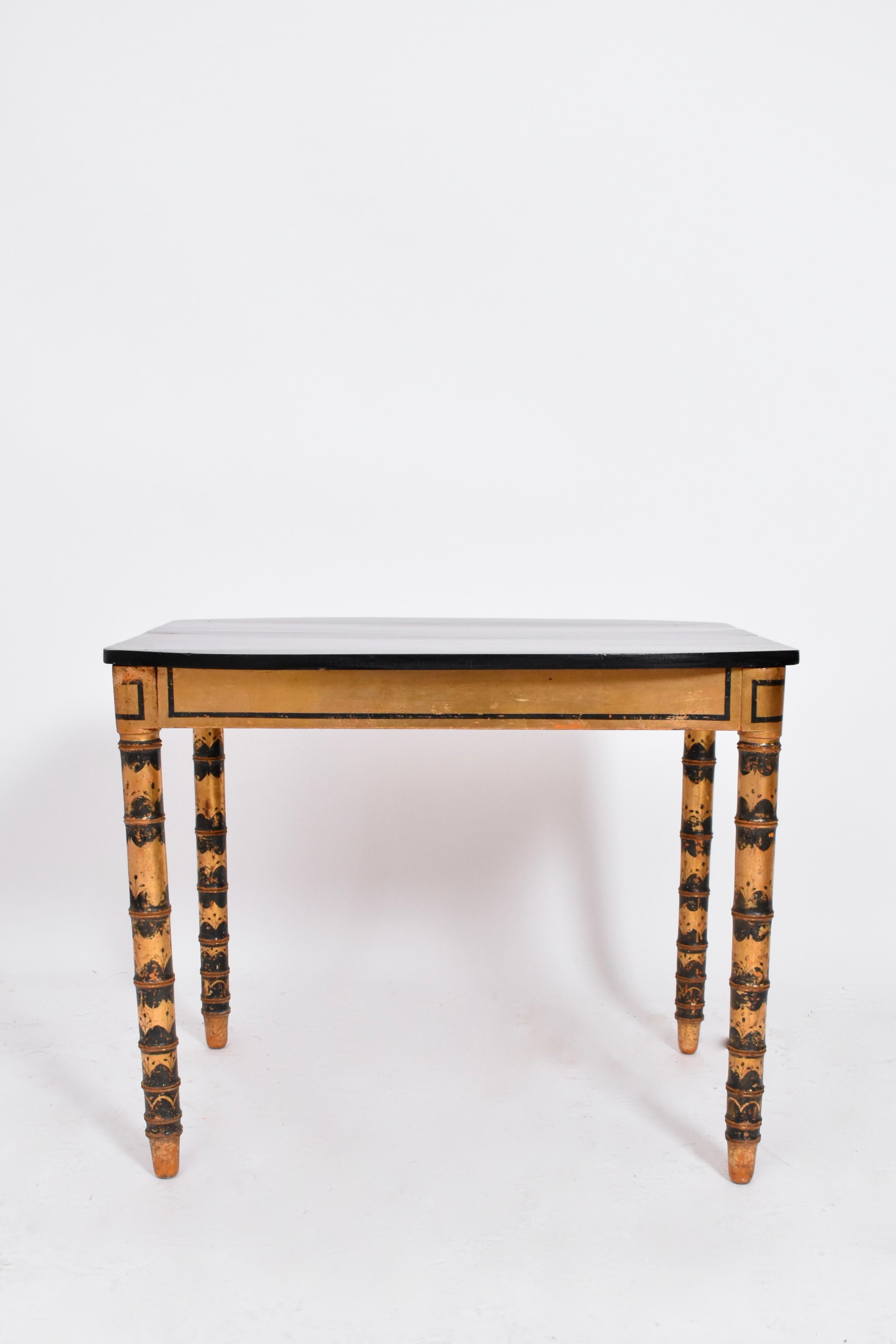 French Ebonised and gold painted table, 1920s For Sale