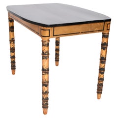 Ebonised and gold painted table, 1920s