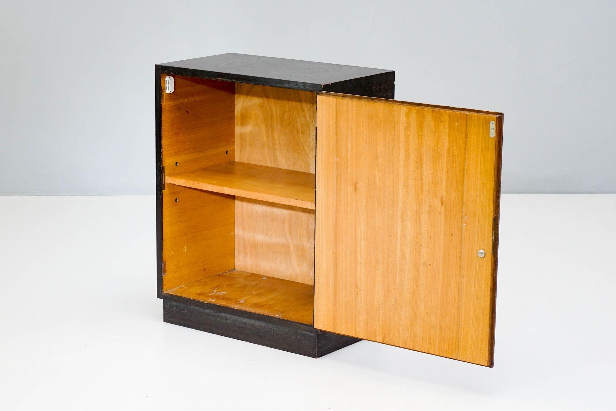 Ebonised and oak cupboard by Franz Schuster. Early twentieth century with original lock and key.

H 67cm x W 51cm x D 30cm

Germany circa 1930