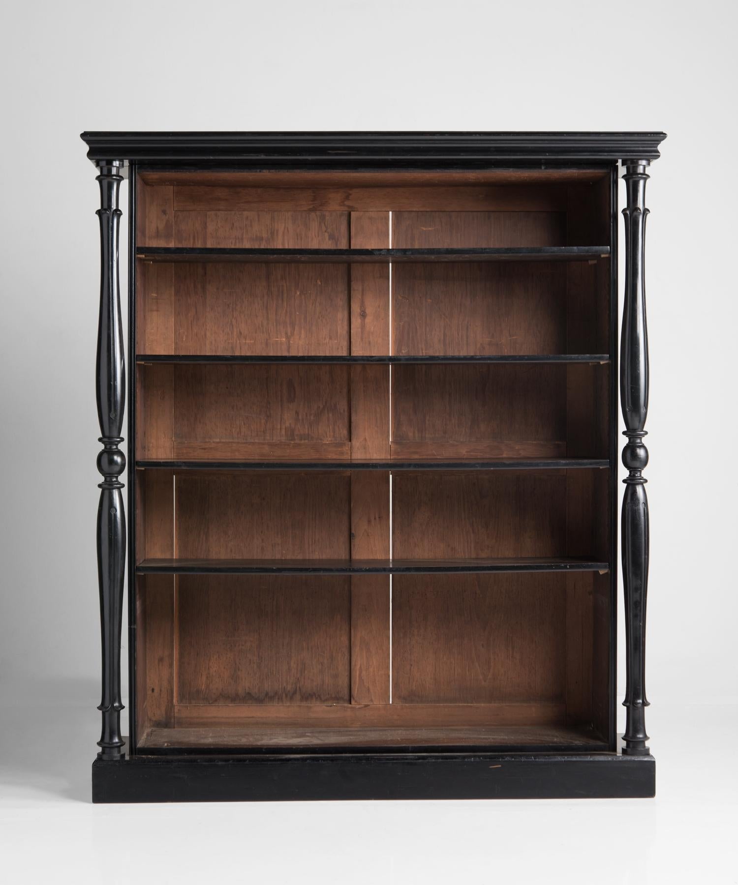 Ebonised bookcase, England, circa 1930.

Handsome form with two hand-turned supports.