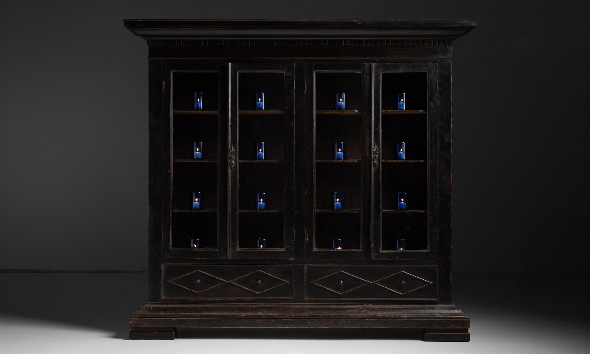 Ebonised Bookcase

Italy circa 1820

Stained pine with glazed doors.

78”L x 16”d x 71.75”h