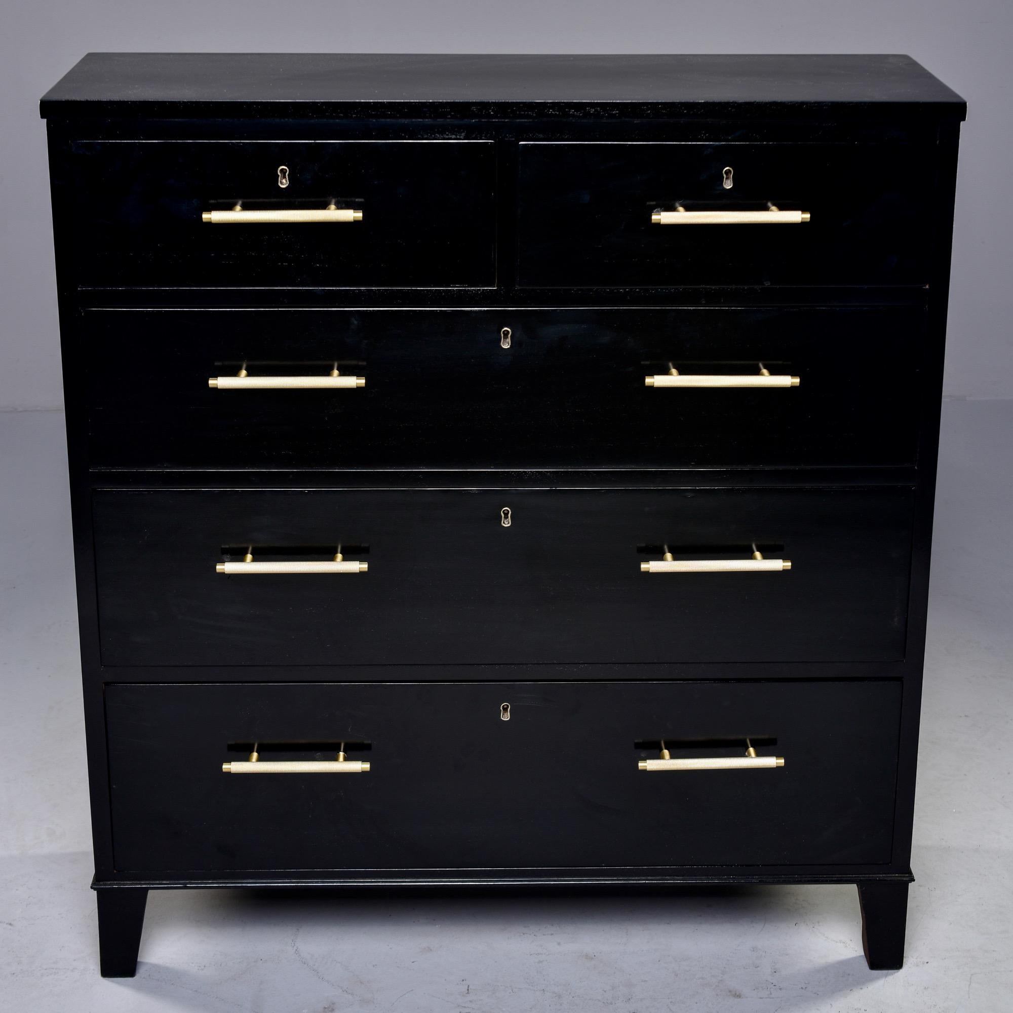 Circa 1940s chest of drawers in mahogany found in England where we had a new, ebonized finish professionally applied. Drawers have dovetail construction, new brass hardware, working lock and key. Unknown maker.