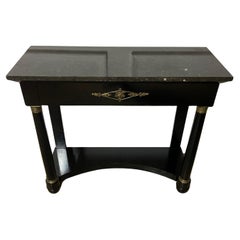 Ebonised console table in the empire style