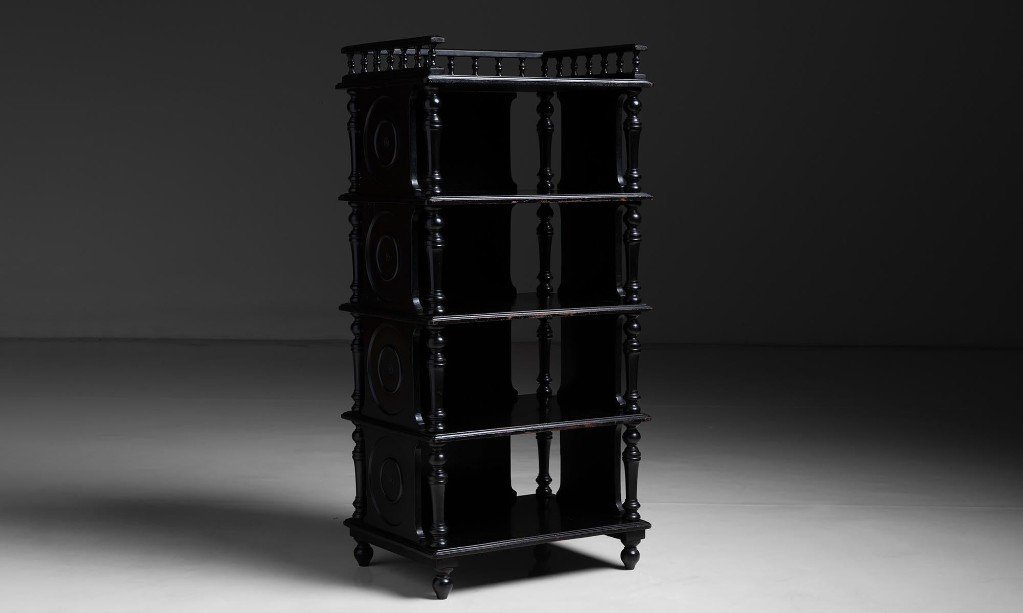 Ebonised Etagere

England circa 1870

Five tiered ebonised shelving unit with finite carved detailing.

Measures 21”w x 15.75”d x 43.5”h