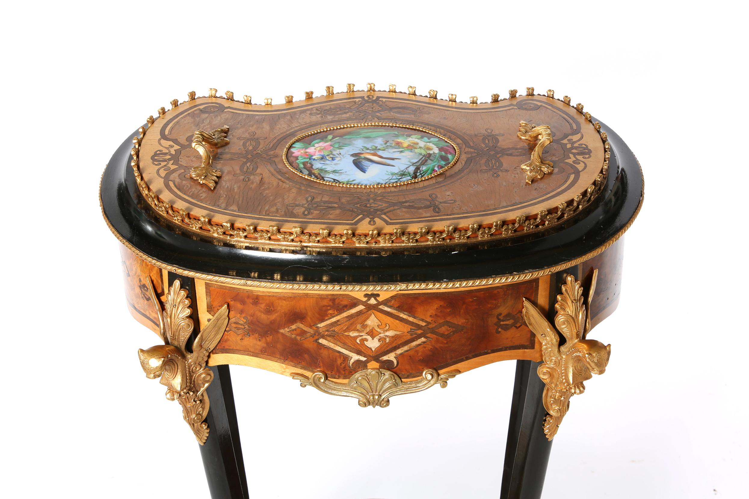 Mid-20th century English bronze mounted ebonized / inlaid wood planter / side table with sevres style porcelain decorative open top cover. The table / planter is in good condition with wear appropriate consistent to age / use. The table stand about