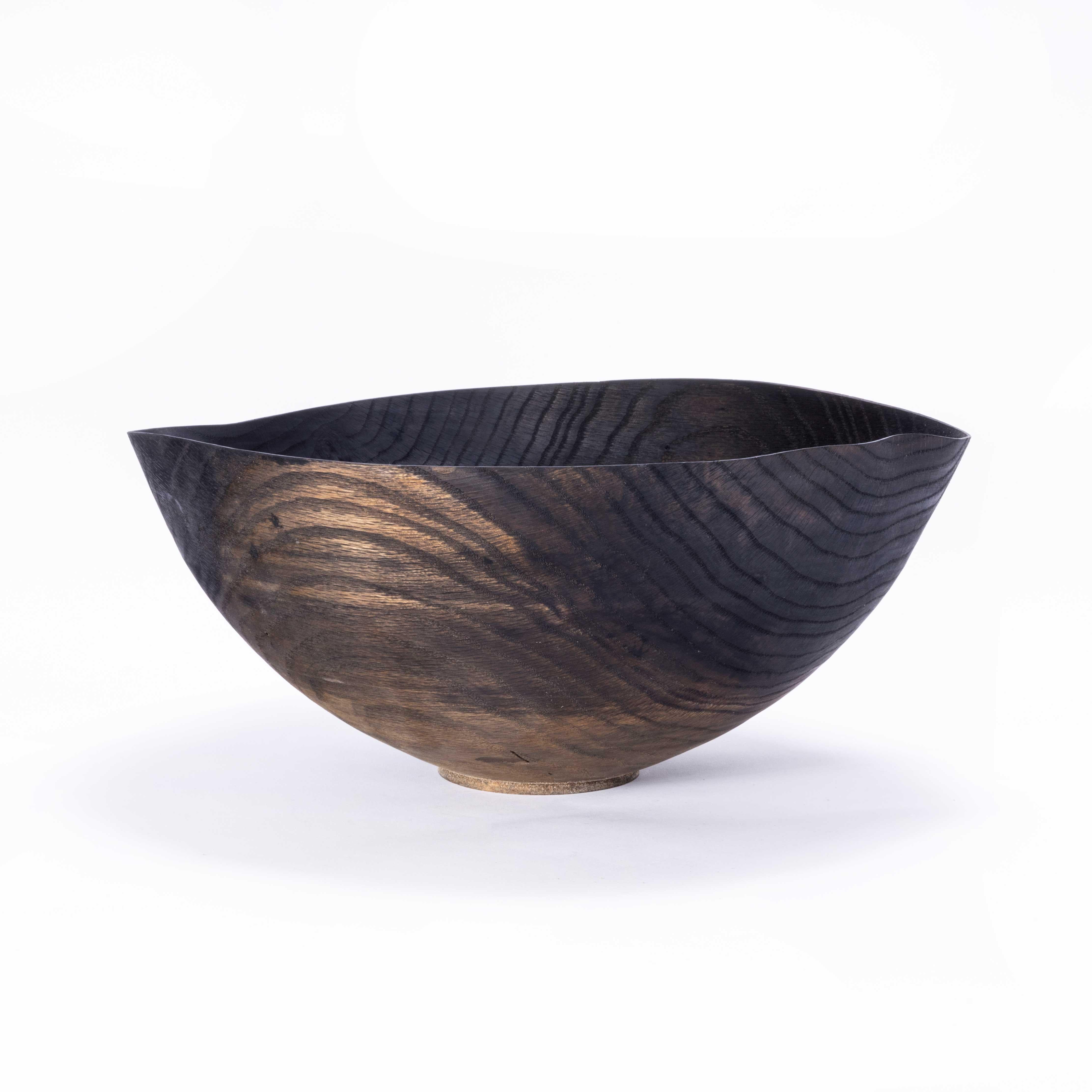 Ebonised Oak Hand Turned Bowl - Tyler & Tara. 

Tyler and Tara are our friends in Knoxville Tennessee, they are contemporary wood turners, sourcing wood locally and hand selecting each piece for turning. This bowl is a unique piece made for us, it