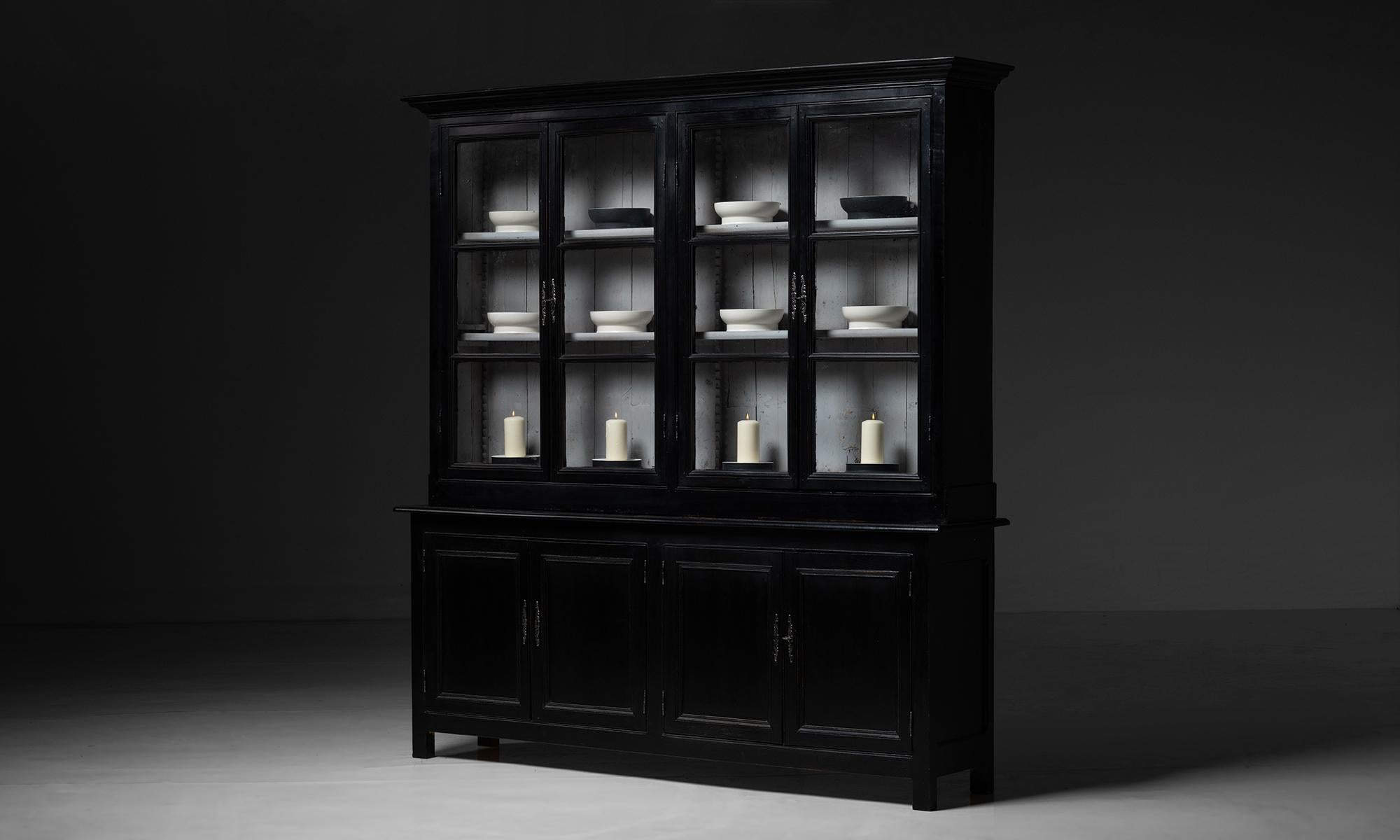 Ebonised Pharmacy Cabinet

England circa 1900

Glass door shelving cabinet with original period paint.

59”w x 23.5”d x 91”h