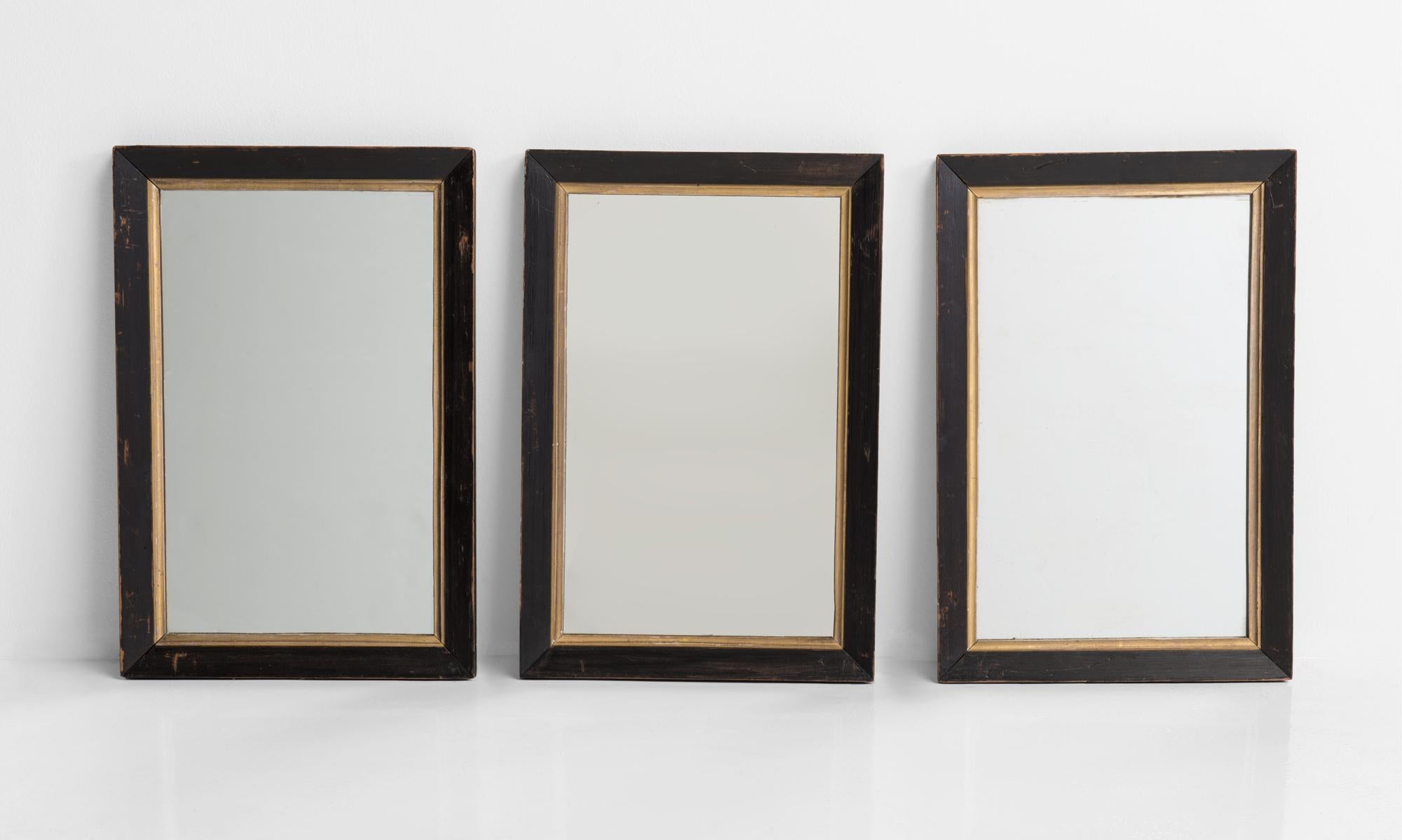 Ebonized and gilt mirrors, England, 19th century.

A beautiful collection of 10 small mirrors. Sold individually. Original ebonized frame with period gilt slips.