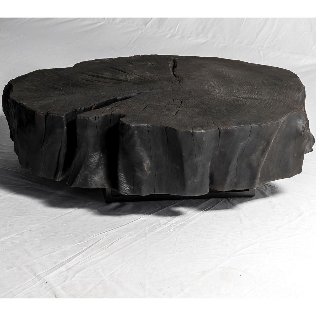 This coffee table is truly one-of-a-kind; handcrafted from a single slice of a poplar tree trunk and set upon a minimalist metal frame. The organic design brings a touch of nature into your interior space.

Handcrafted in Belgium by a small