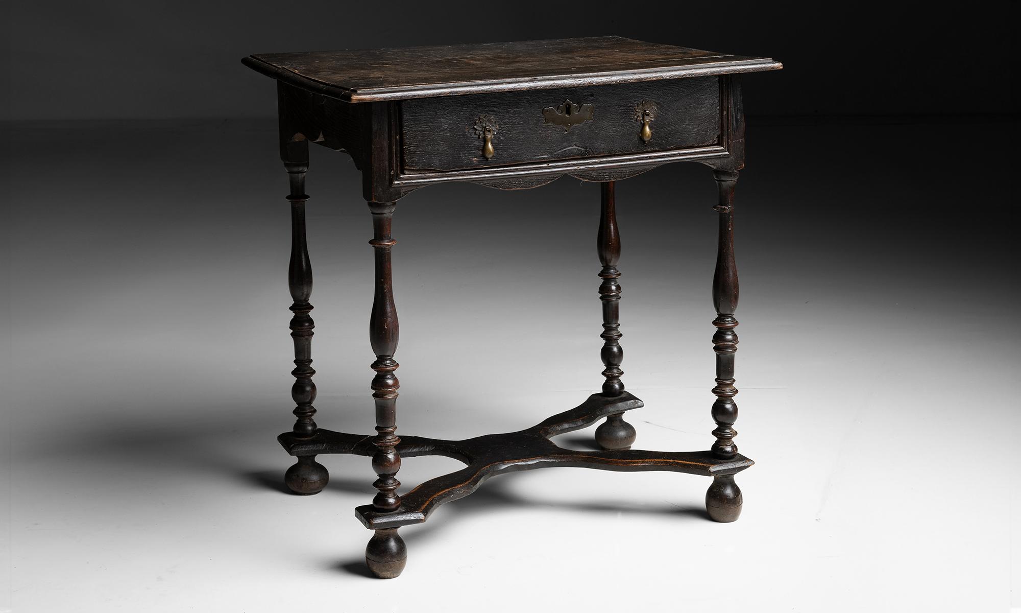 Ebonised Side Table

England circa 1680

Ebonised oak side table with turned legs and brass hardware.

27.25”w x 21.5”d x 28.75”h