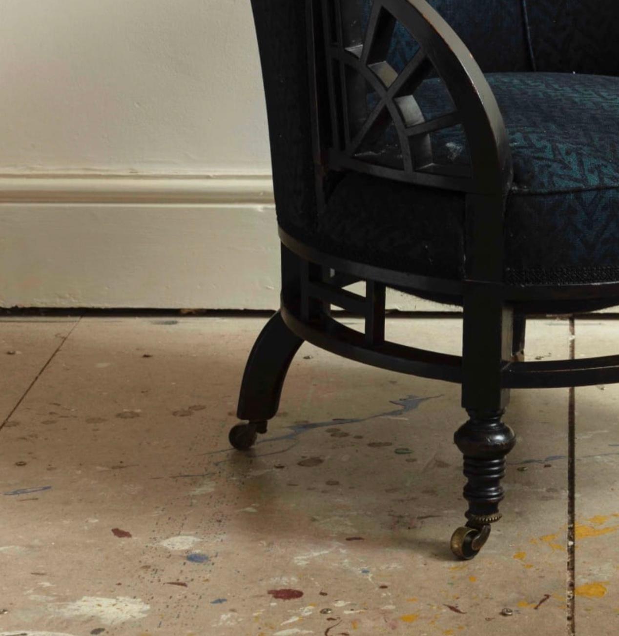 Charming ‘Anglo Japanese’ ebonised tub chair in the style of E.W. Godwin.
England c. 1870s

Provenance: Fine Art Society, Bond Street, London 1980s, Private collection London and Sussex, UK.
