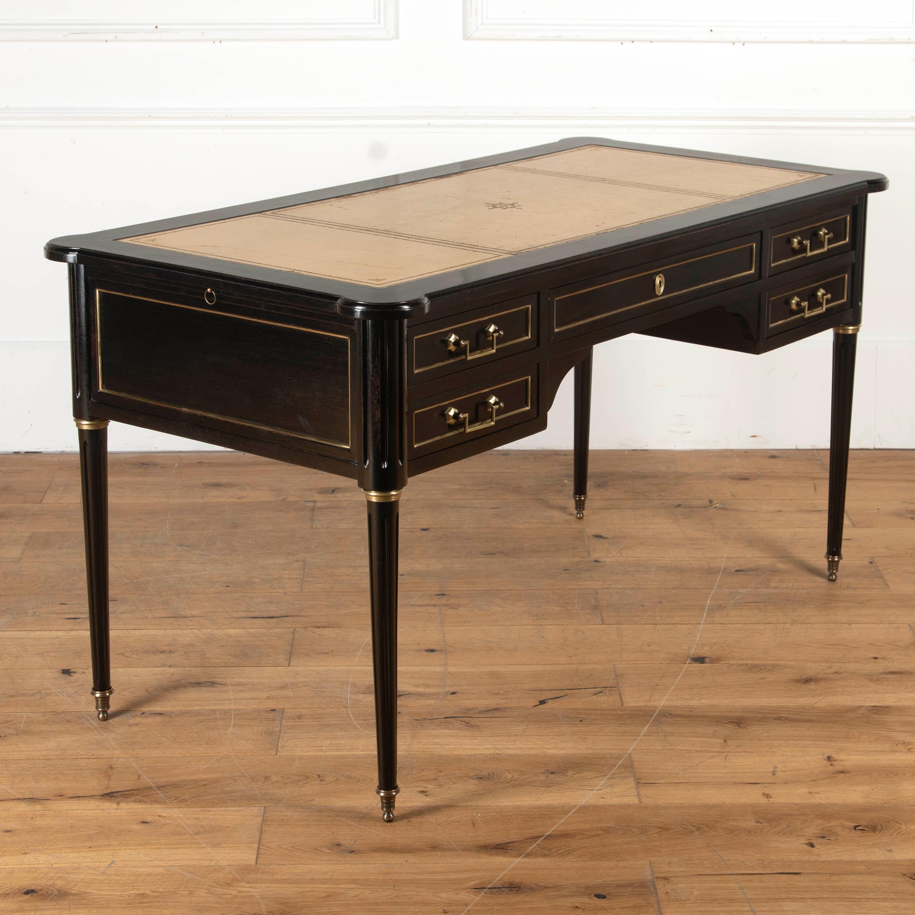 Ebonised writing desk.

Of French origin and dating from the Early 20th Century, Circa 1930's, this ebonised mahogany writing desk has a leather inset top with two drawers to each side. The drawers flank the central kneehole below with a long