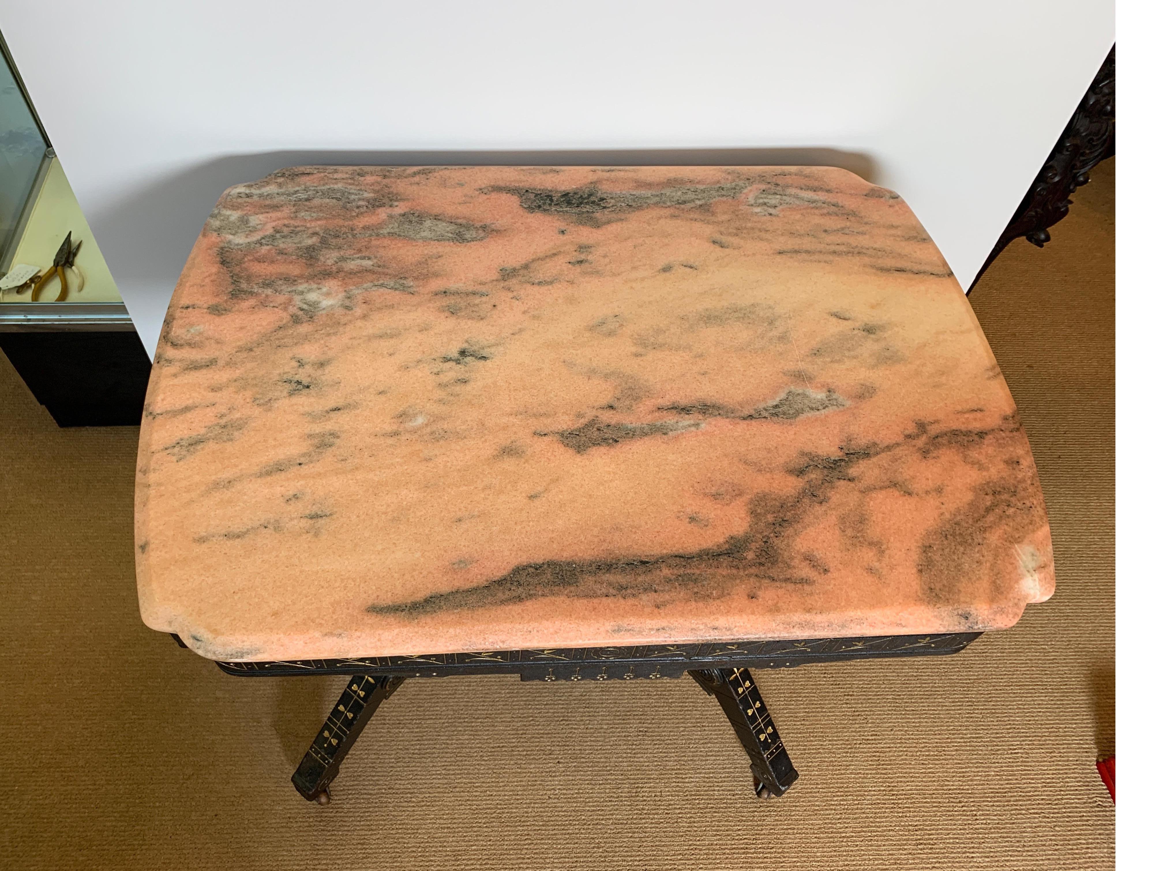 Late 19th Century Ebonized Aesthetic Movement Parlor Table with Pink Marble Top and Gold Decor
