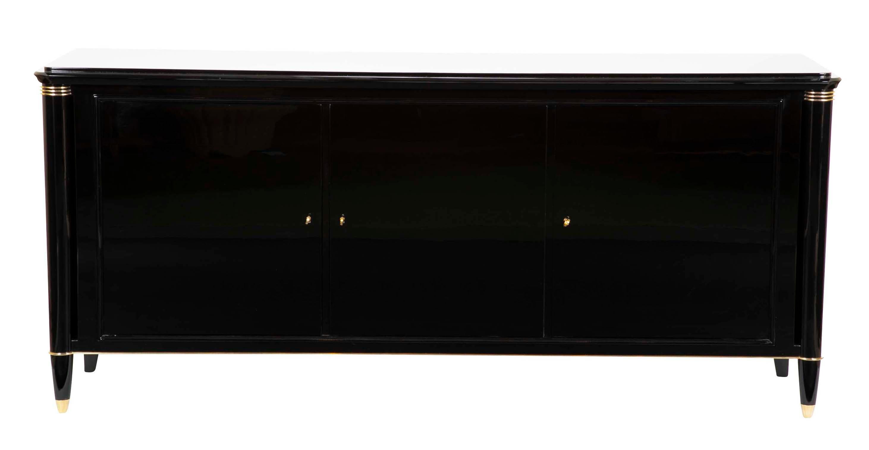 This credenza was designed by Batistin Spade and was suplied to the estate from which we purchased it by Robert Courturier. It retains its tag, 