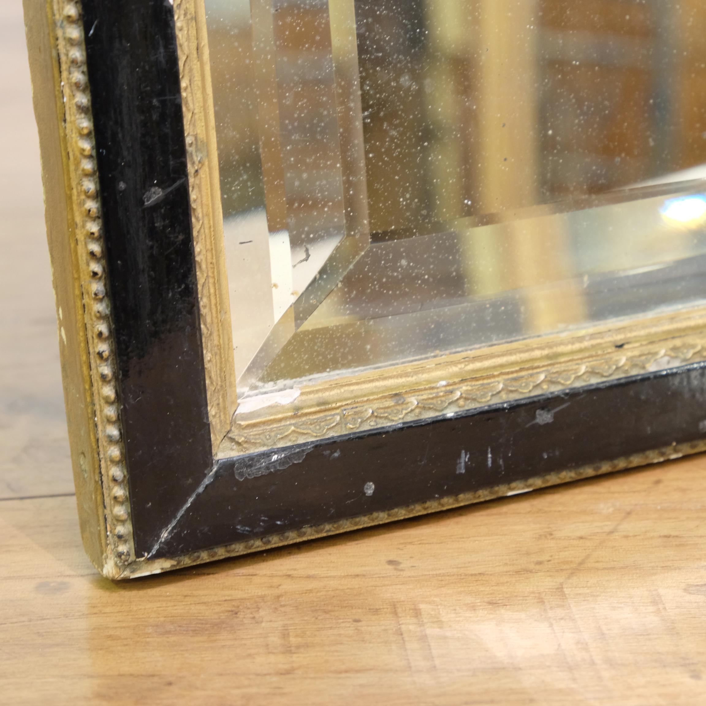 Ebonized and Gilt Framed French Double Bevelled Small Mirror, Late 19th Century In Distressed Condition In Totnes, GB
