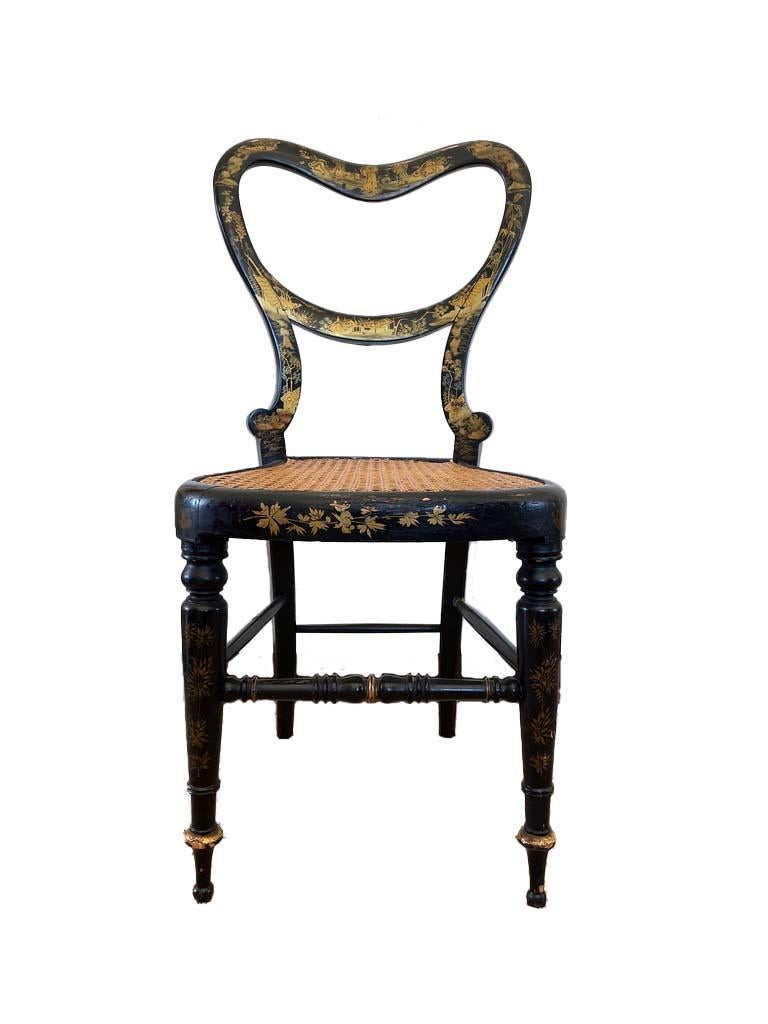 Cane Ebonized and Gold Leaf Painted Regency Chairs, a Pair For Sale