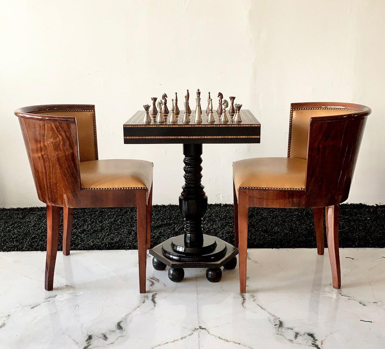 This art deco game table is simply stunning. This piece came from an estate in Ojai with its own vineyard that was furnished with the most magnificent French art deco pieces I've ever seen. This vintage game table is ebonized black with multiple
