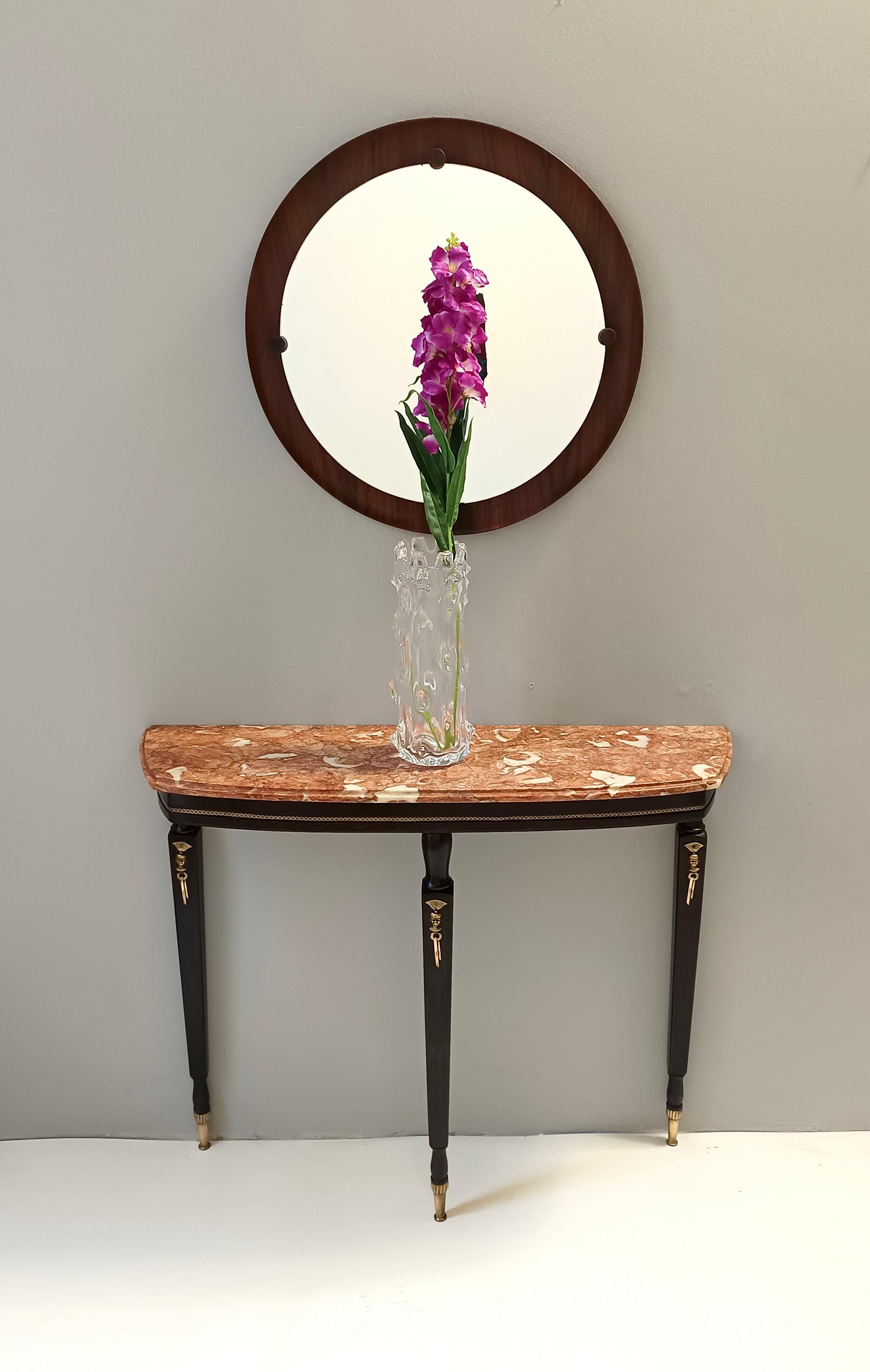 Made in Italy, 1950s.
This console table has an ebonized beech frame with brass details and an orange Breccia Pernice marble top. 
This very elegant console may show slight traces of use since it's vintage, but it can be considered as in excellent
