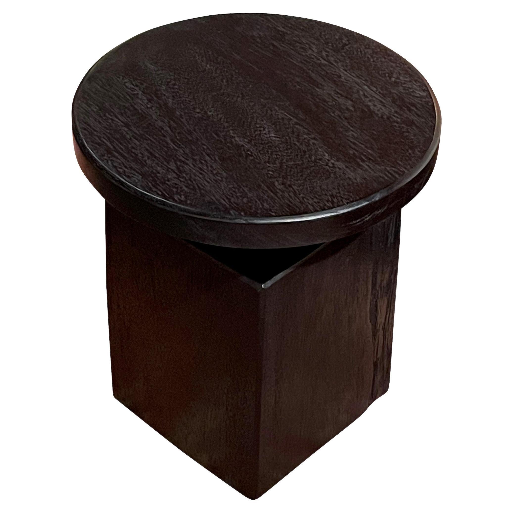 Contemporary Indonesian round over square shaped side table.
Ebonized lychee wood.
Two available and sold individually.