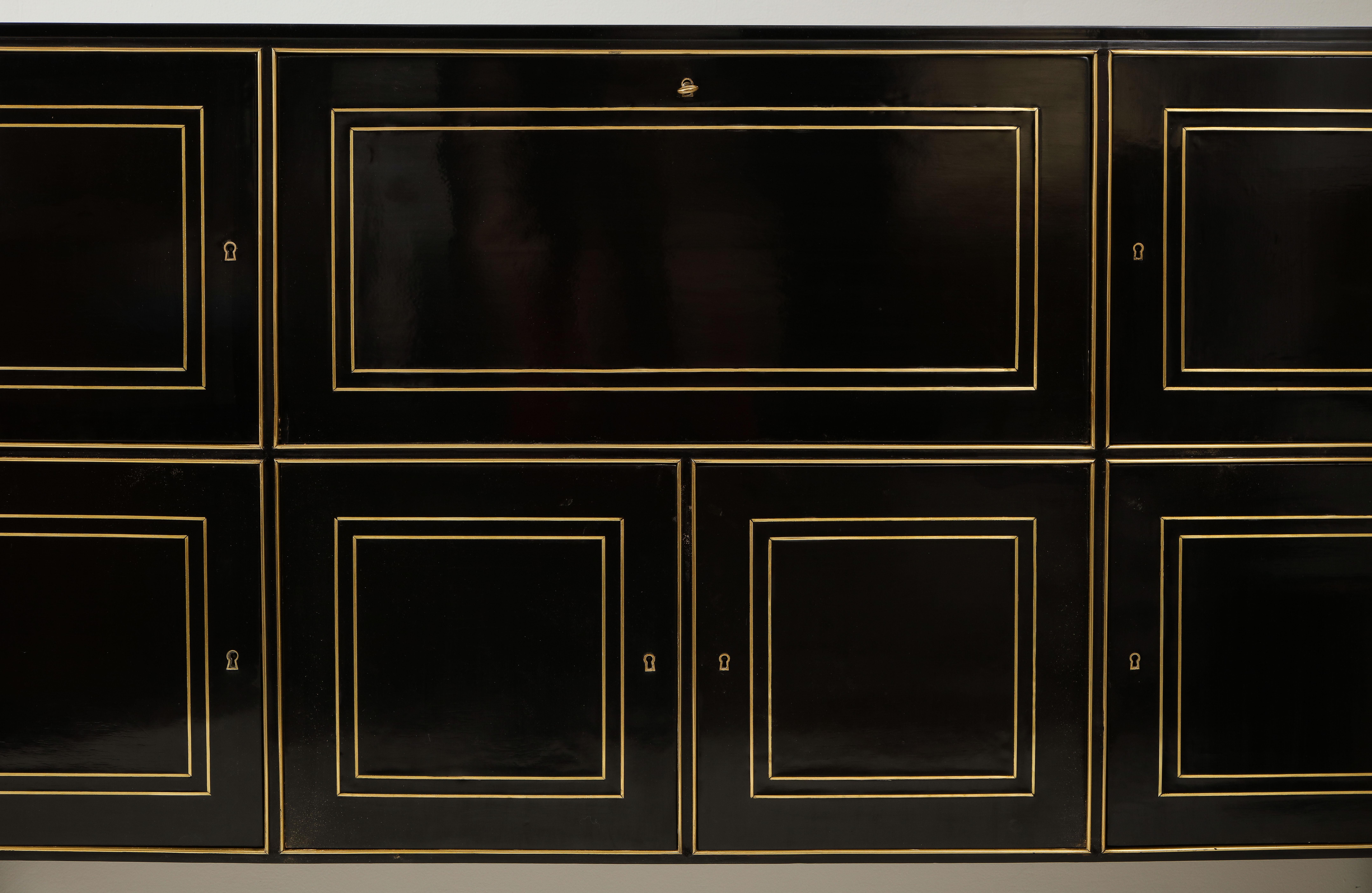 Modern Ebonized Cabinet with Brass-Inlays on Tapered Legs