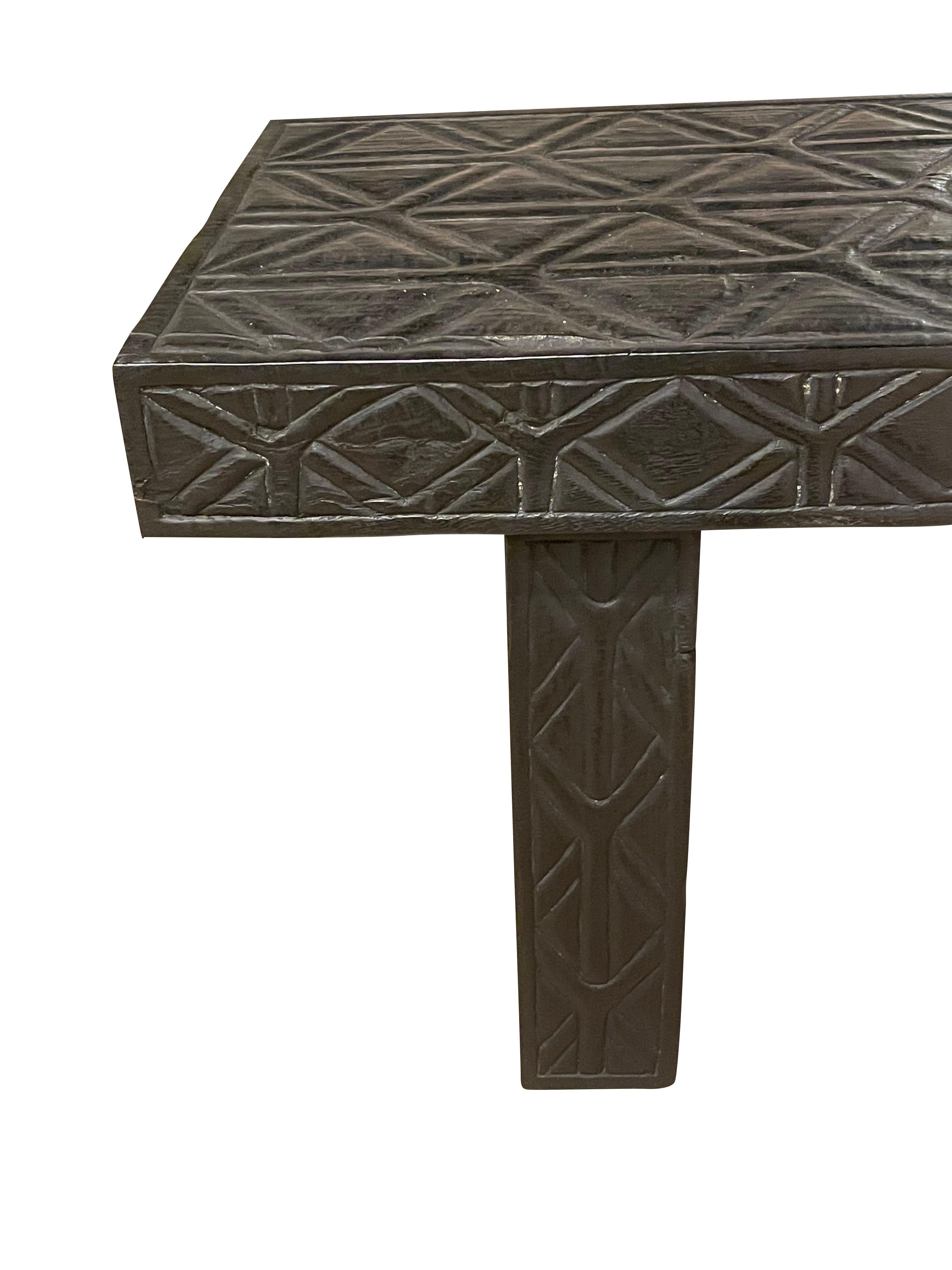 Contemporary Indonesian ebonized bench with decorative carving.
ARRIVING NOVEMBER