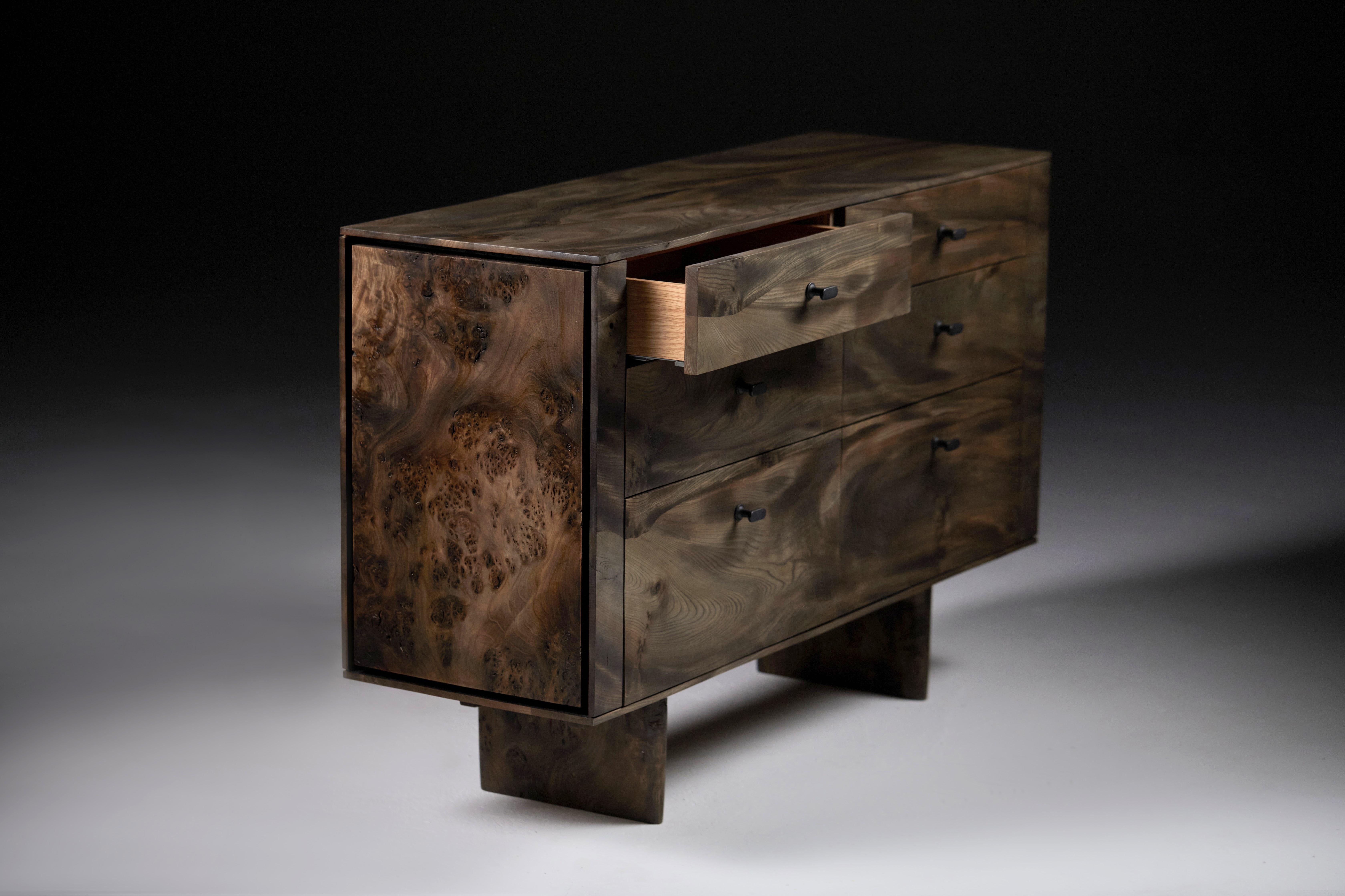 Chest of Drawers in Ebonized Scottish Elm. 

Size:  1220 mm  L x 400 mm W x 795 mm high.
With bronze drawer pulls, oak internal drawer boxes of solid oak and fully extendable soft close runners. 
Made in January 2023, The consecutive project number