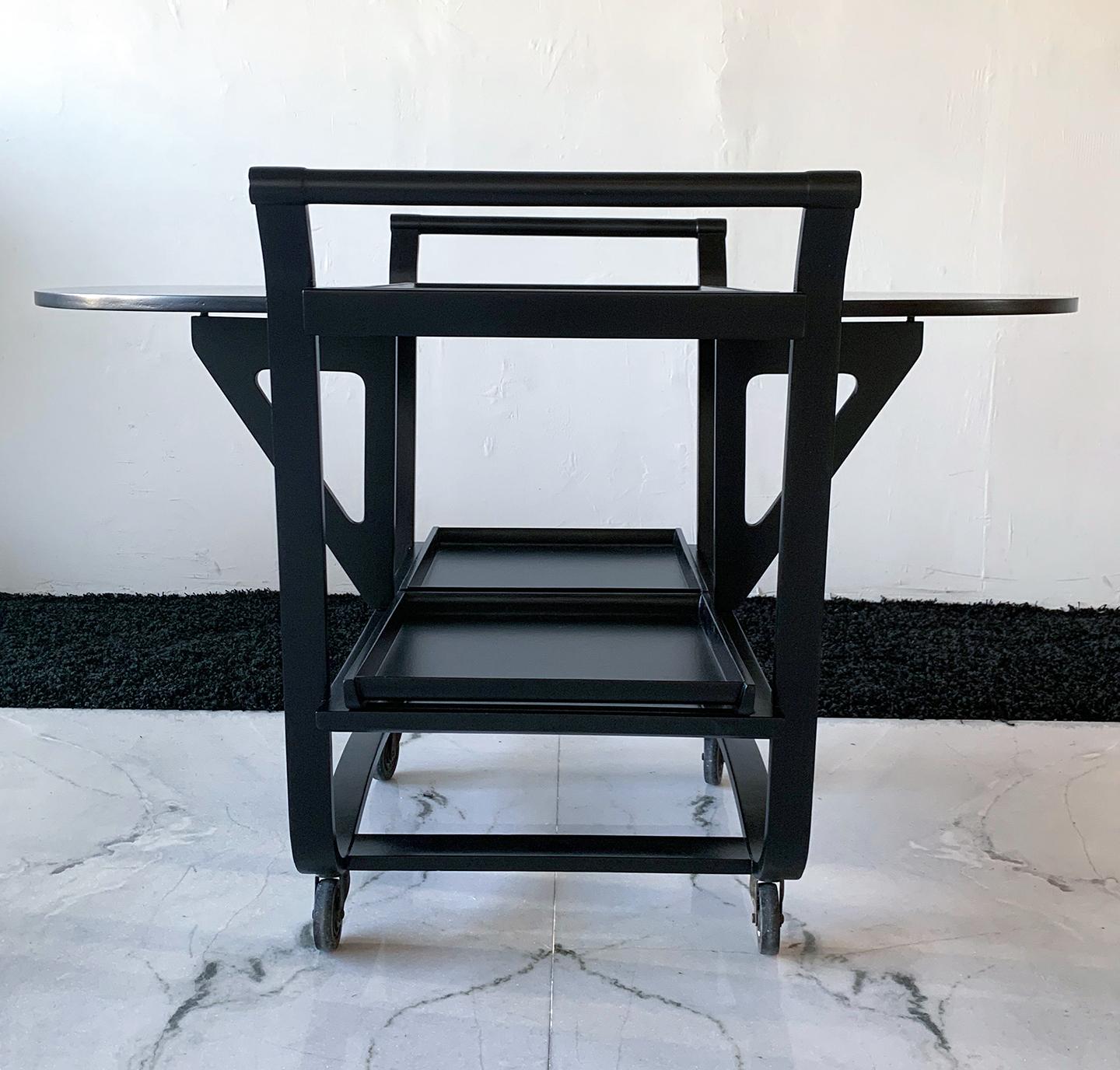 Available right now we have this absolutely stunning ebonized bar cart by Edward Wormley for Dunbar, circa 1950s, Italy. Often imitated, but never replicated, the fine craftsmanship of this Wormley bar cart in unmistakable. 

This bar cart is a