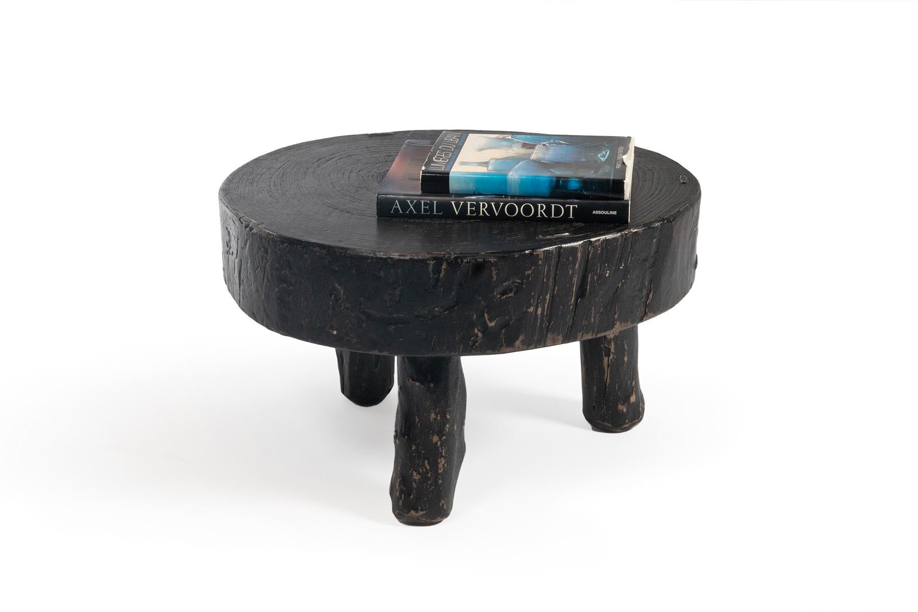 This elm block coffee table features a beautiful distressed ebonized finish and cleat details. Style individually in a small seating area or with its shorter version as side tables or paired coffee tables. 

This piece is a part of Brendan Bass’s