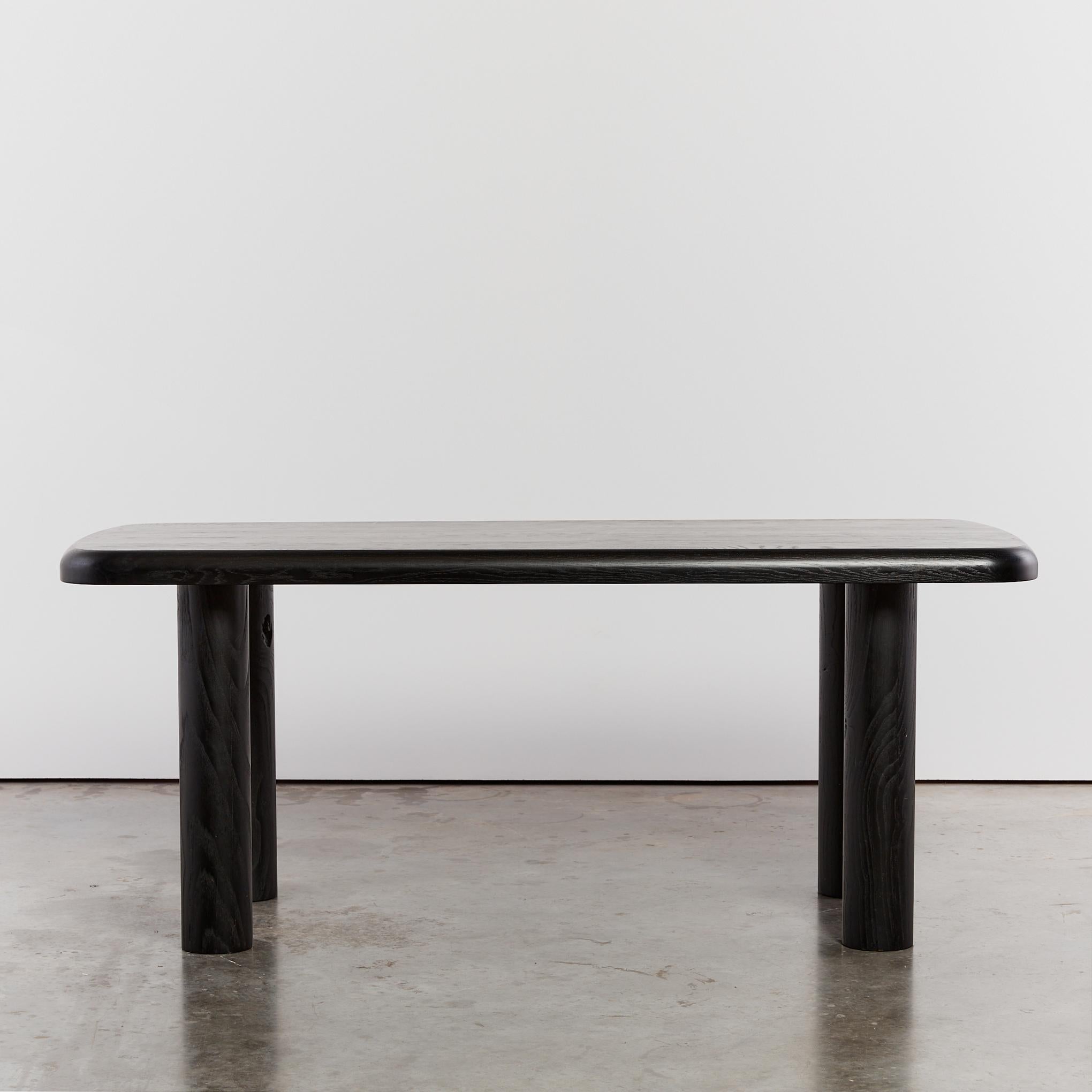 Ebonised elm dining table with statement column legs that sits 6-8 guests.

Period: Circa 1970's

Origin: Spain

Dimensions: L175 x W85 x H75cm

Condition: Vintage condition - slight signs of wear on surface consistent with age