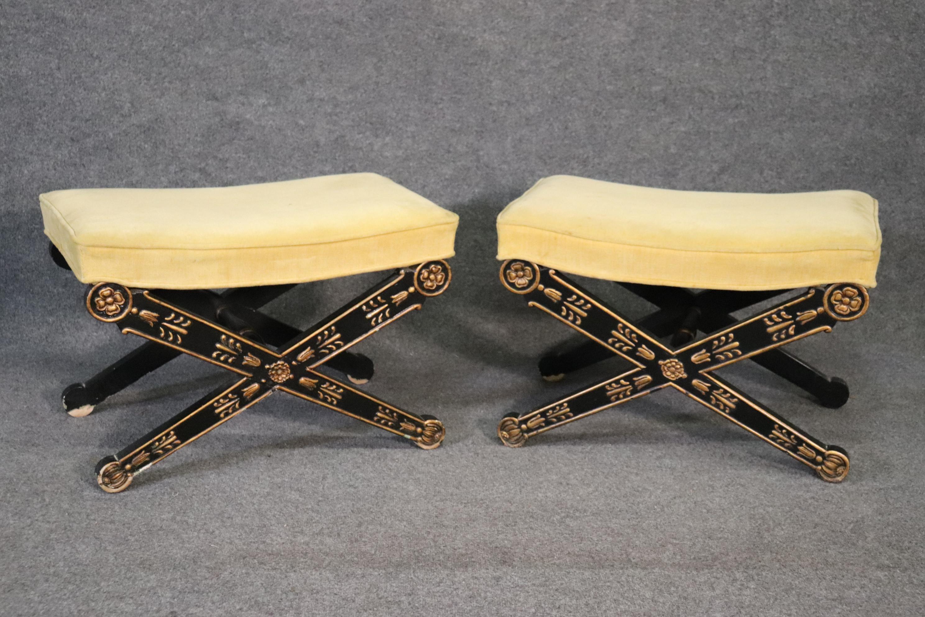 These are absolutely beautiful French directoire style with black painted frames and gold gilded carved details. The benches are from the 1950s Draper era and are in good original condition. The benches measure 26 wide x 18 inches deep x 17 inches