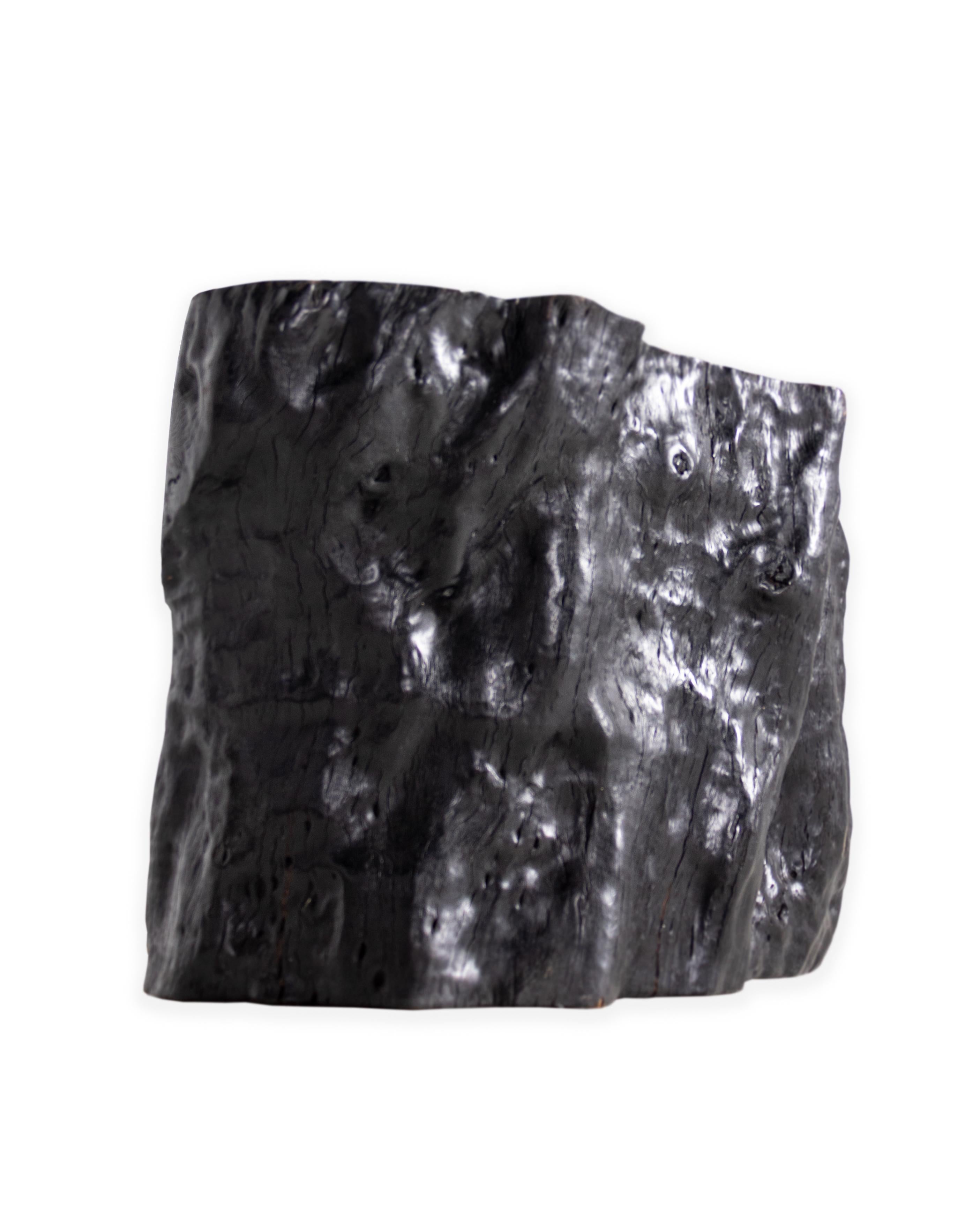 Ebonized lychee wood organic form side table. 

Piece from the Le Monde collection. Exclusive to Brendan Bass.
   